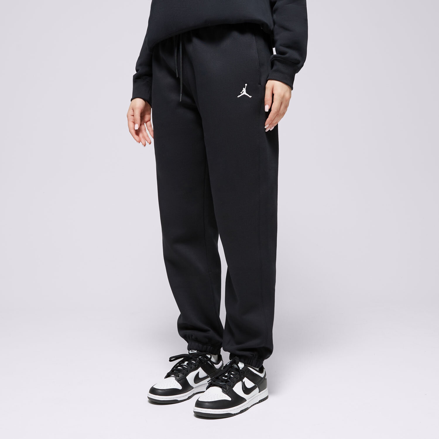 Spodnie sportowe damskie SPODNIE W JORDAN BRKLN FLC PANT 24 FV7077-010 CZARNY