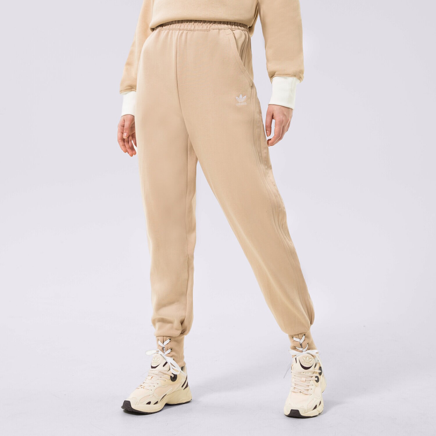 Spodnie sportowe damskie ADIDAS SPODNIE CUFFED PANT HK5065 BEŻOWY