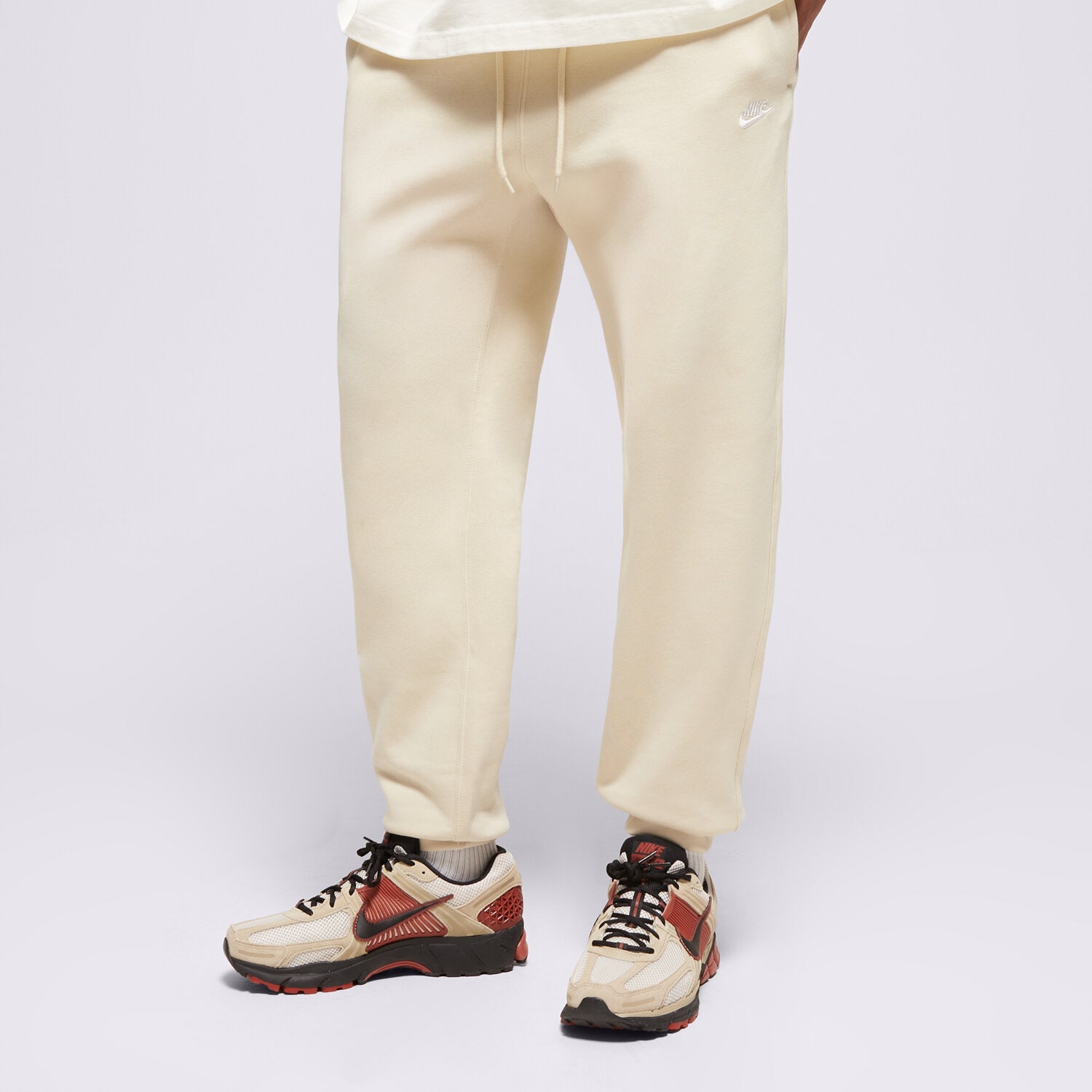 Spodnie sportowe męskie NIKE SPODNIE M NK CLUB BB JOGGER FN3787-229 BEŻOWY