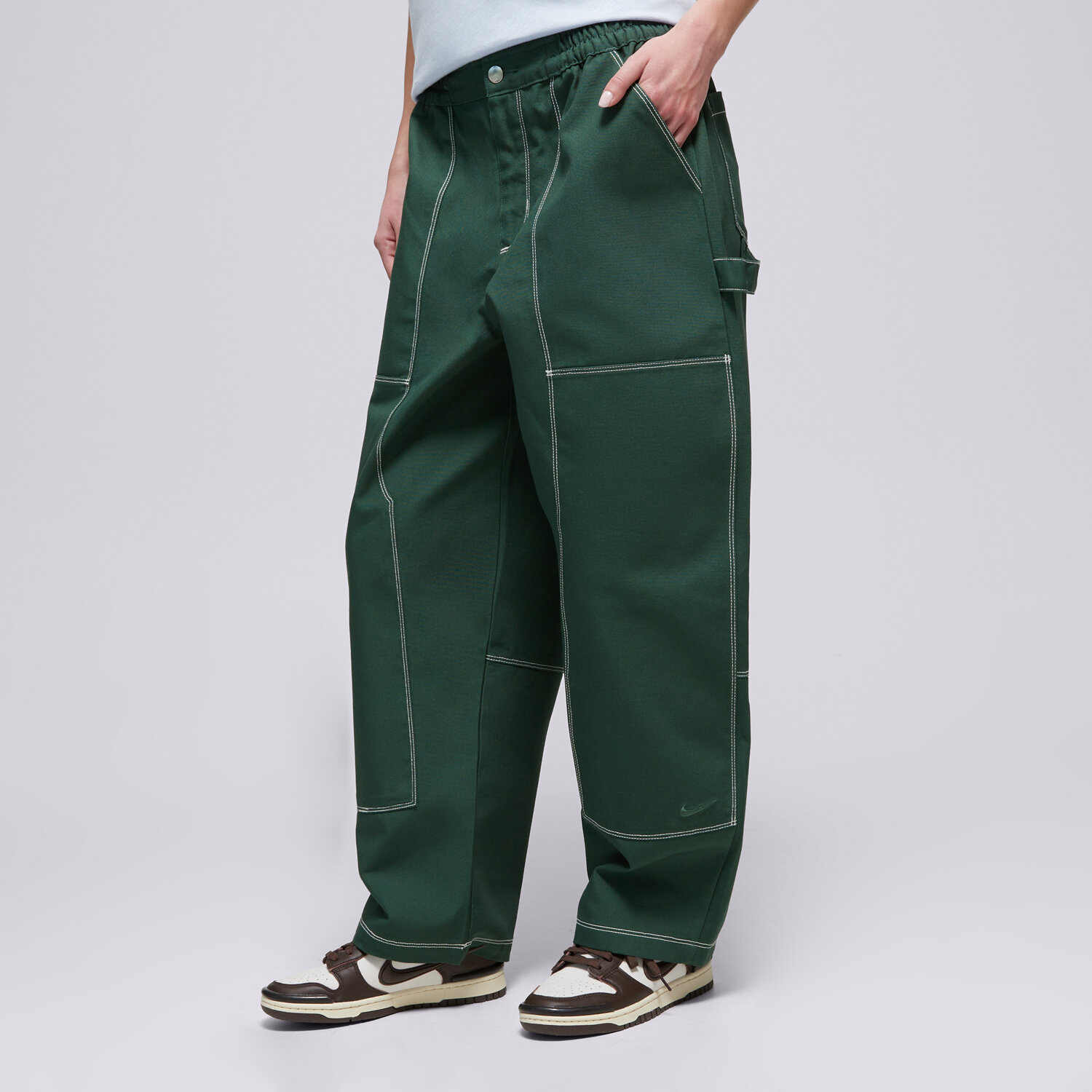 Spodnie sportowe damskie NIKE SPODNIE STREET CARPENTER LR PANT W NSW IF0311-323 ZIELONY