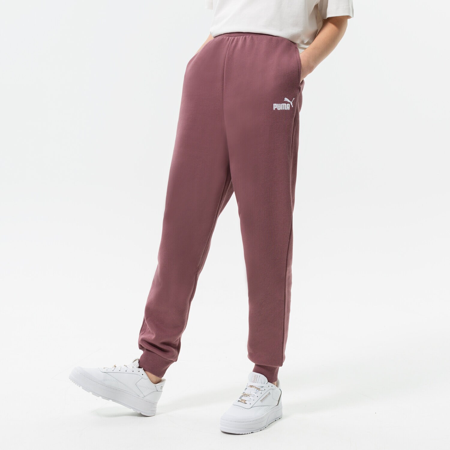 Spodnie sportowe damskie PUMA SPODNIE ESS+ EMBROIDERY HIGH-WAIST FL 670007 75 FIOLETOWY