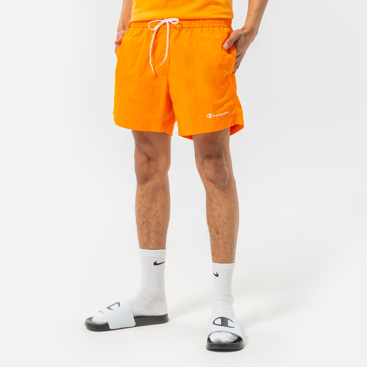 Krótkie spodenki, szorty męskie CHAMPION SZORTY BEACHSHORT 216069OS017 POMARAŃCZOWY