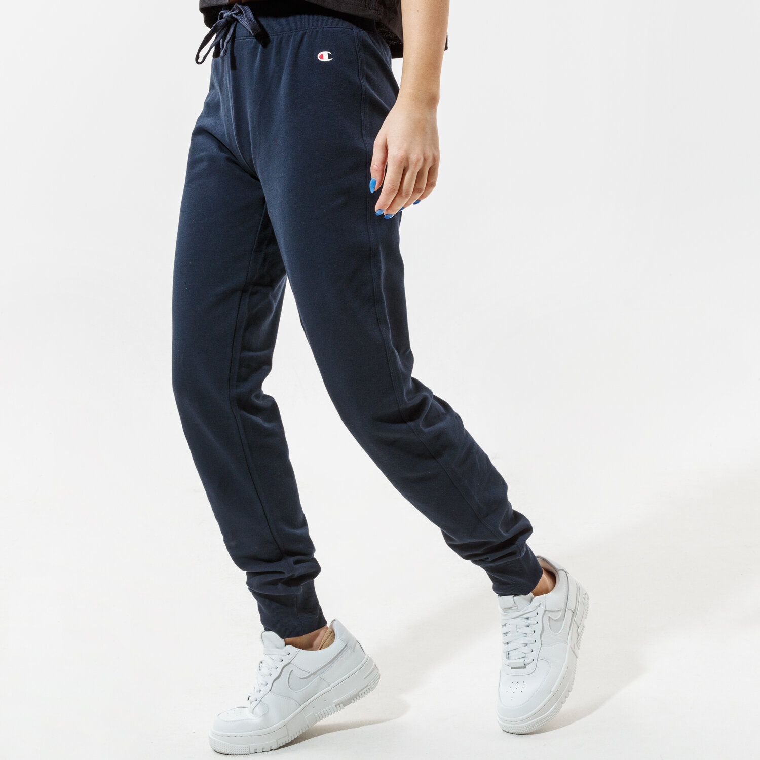 Spodnie sportowe damskie CHAMPION SPODNIE RIB CUFF PANTS 111414BS501 GRANATOWY