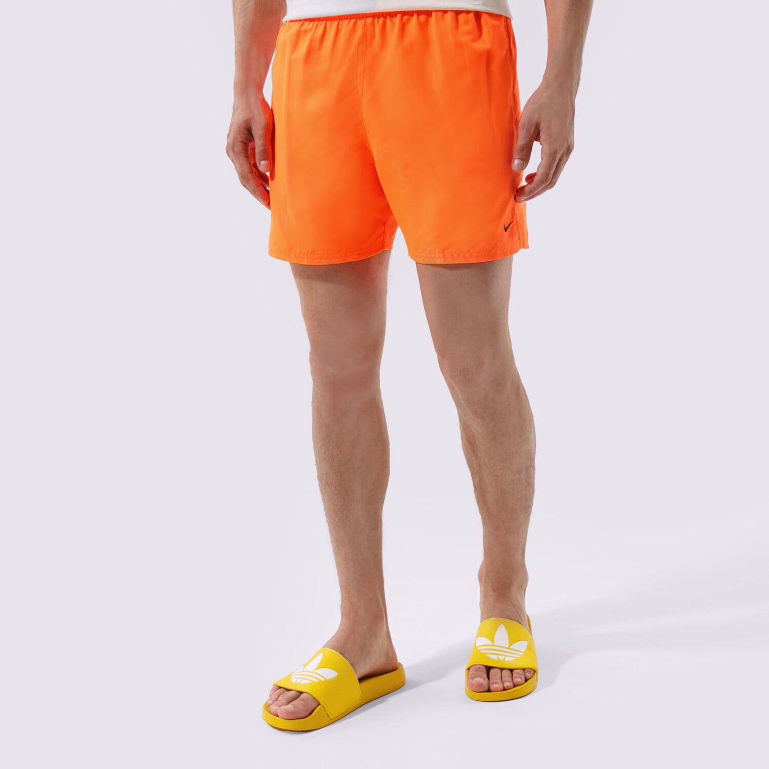 Krótkie spodenki, szorty męskie NIKE SWIM SZORTY ESSENTIAL 5" NESSA560-822 POMARAŃCZOWY