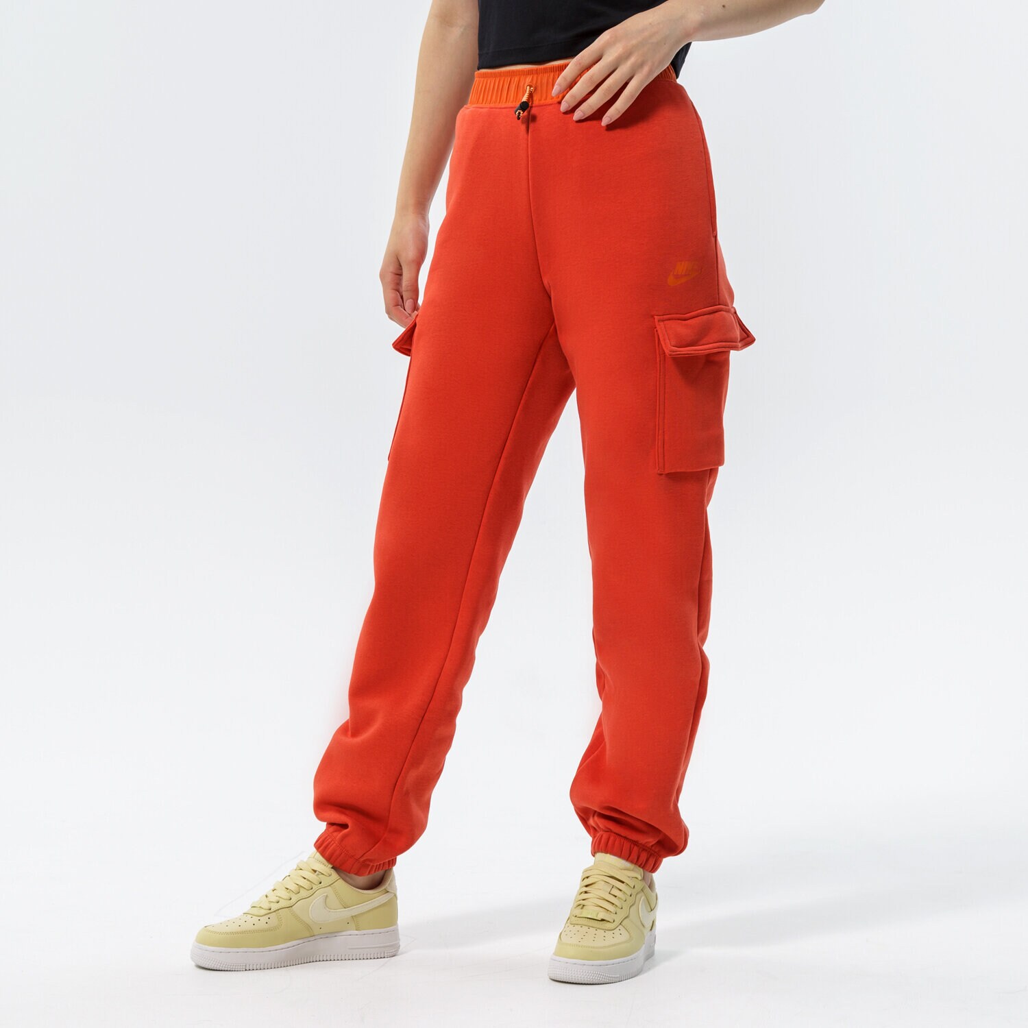 Spodnie sportowe damskie NIKE SPODNIE W NSW CARGO PANT LOOSE FLC UU DD3607-852 POMARAŃCZOWY