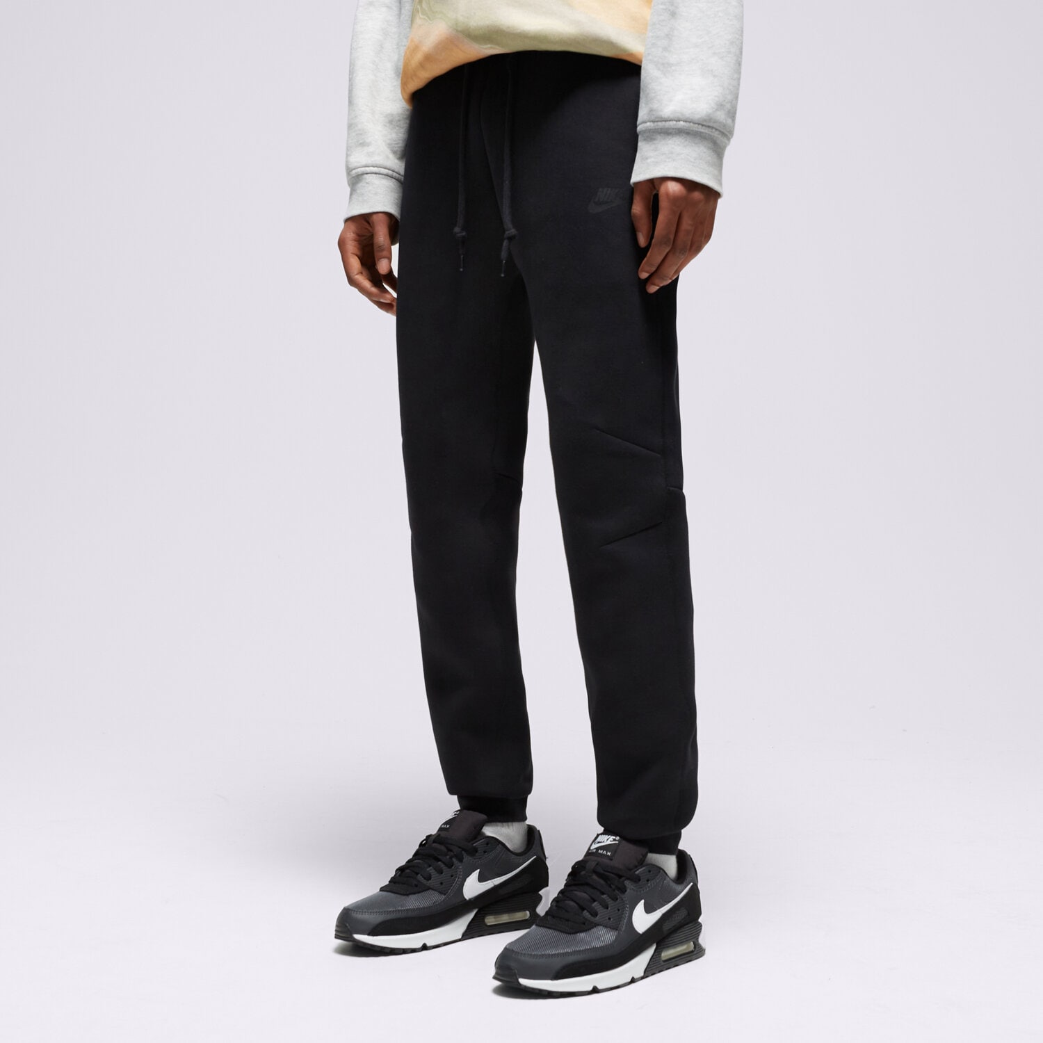 Spodnie sportowe męskie NIKE SPODNIE M NK TCH FLC JGGR FB8002-010 CZARNY