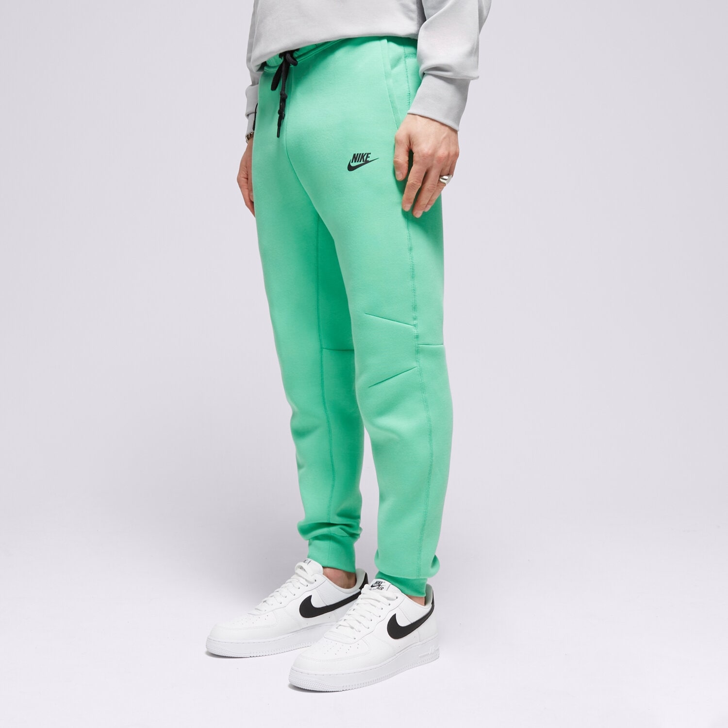 Spodnie sportowe męskie NIKE SPODNIE M NK TCH FLC JGGR FB8002-363 ZIELONY
