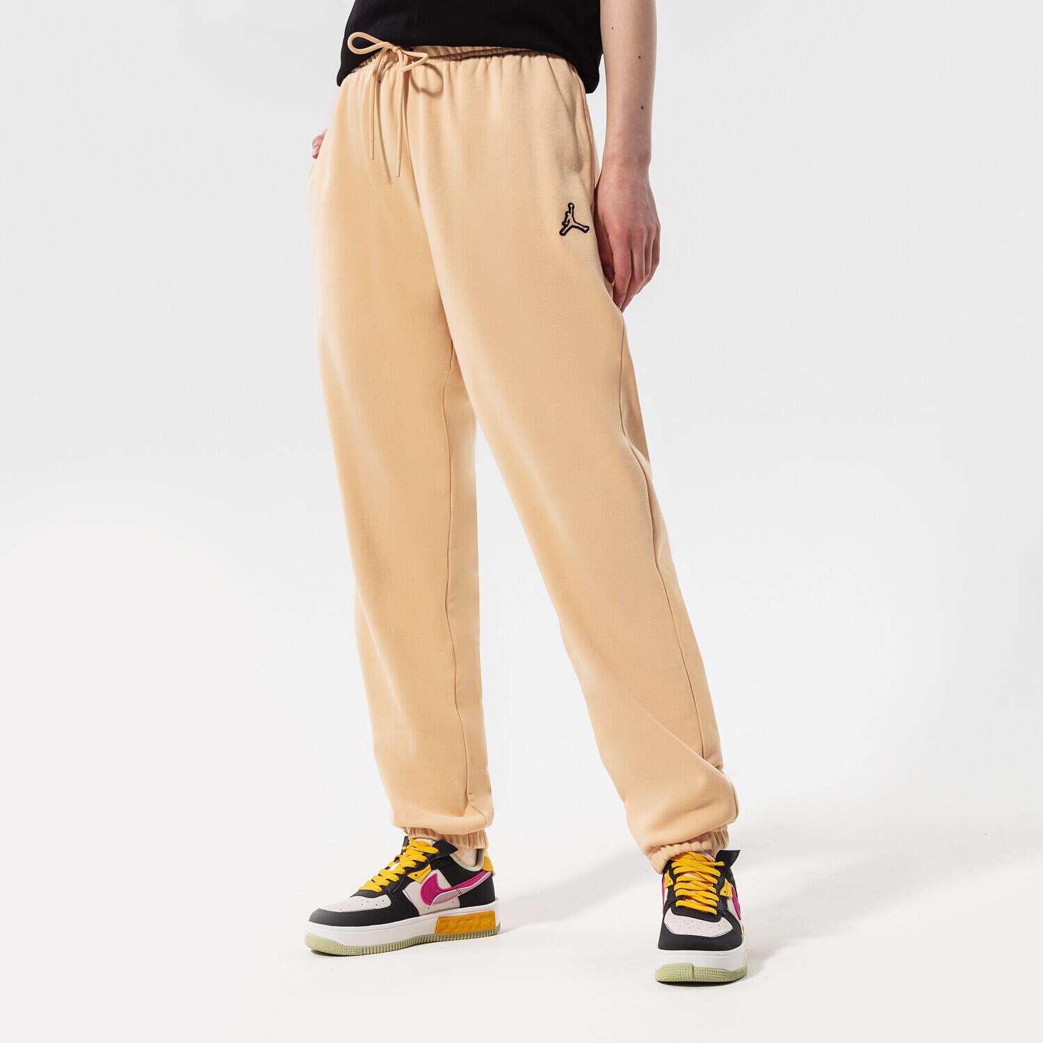 Spodnie sportowe damskie JORDAN SPODNIE W J FLC PANT CORE DN4575-268 BEŻOWY
