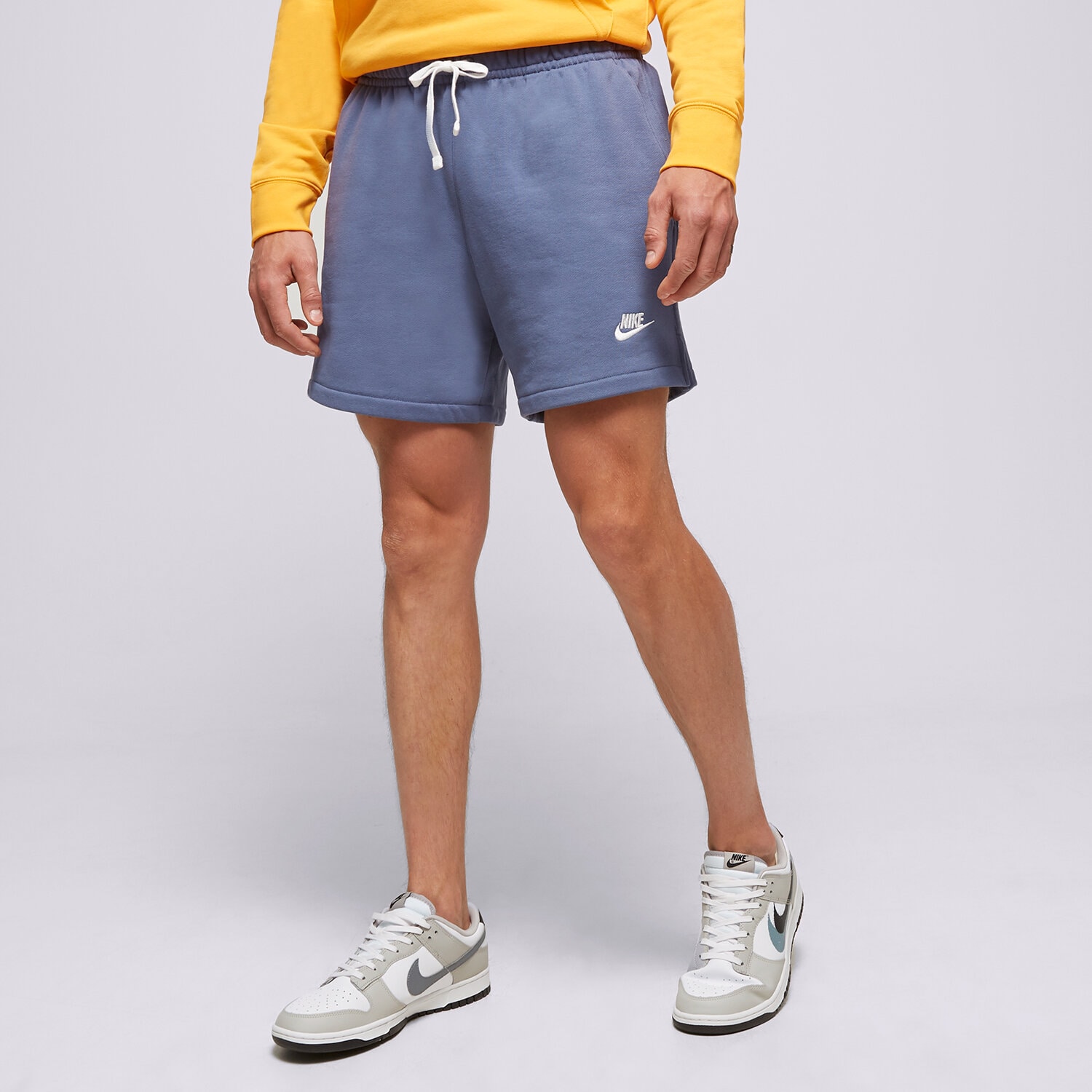 Krótkie spodenki, szorty męskie NIKE SZORTY M NK CLUB FT FLOW DX0731-491 NIEBIESKI