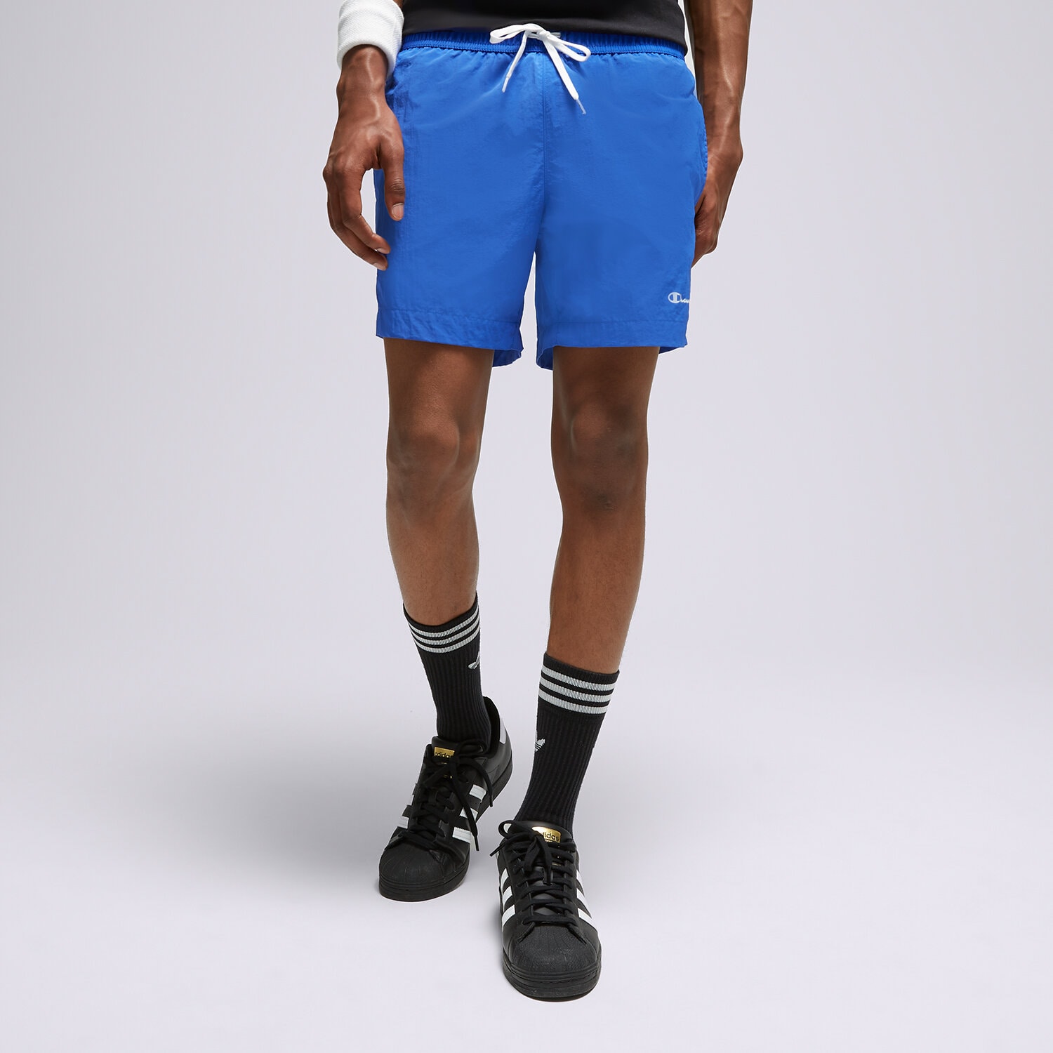 Krótkie spodenki, szorty męskie CHAMPION SZORTY BEACHSHORT 216069BS071 NIEBIESKI
