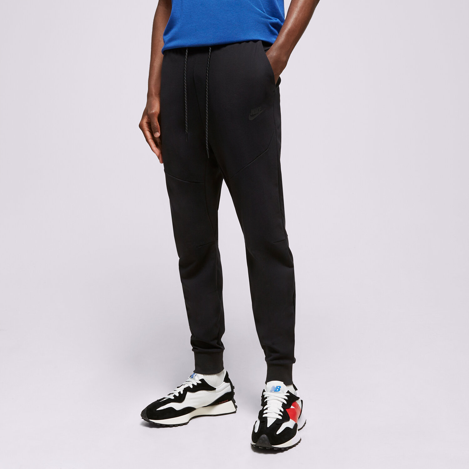 Spodnie sportowe męskie NIKE SPODNIE M NK TECH LGHTWHT JGGR DX0826-010 CZARNY