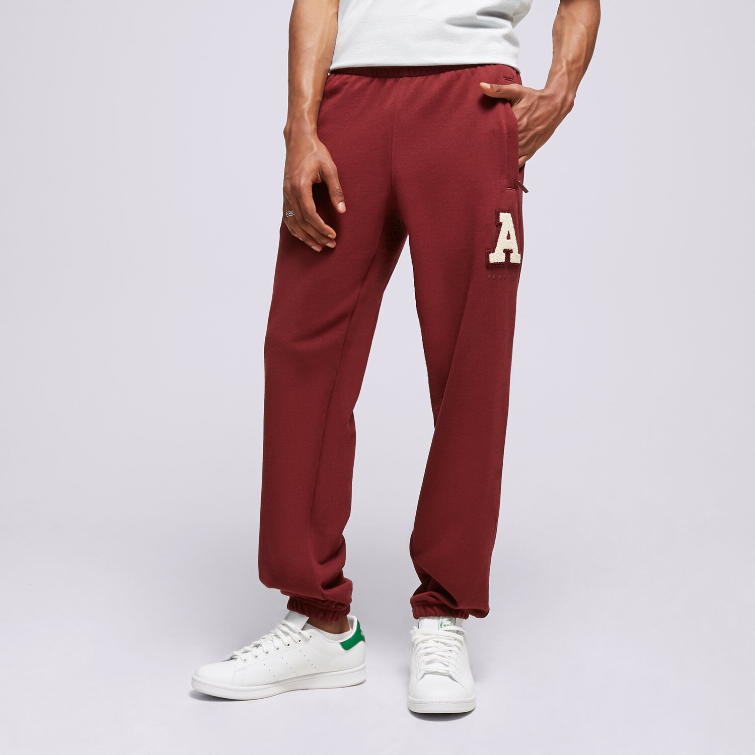 Spodnie sportowe męskie ADIDAS SPODNIE METRO SWEATPANT IC8398 FIOLETOWY