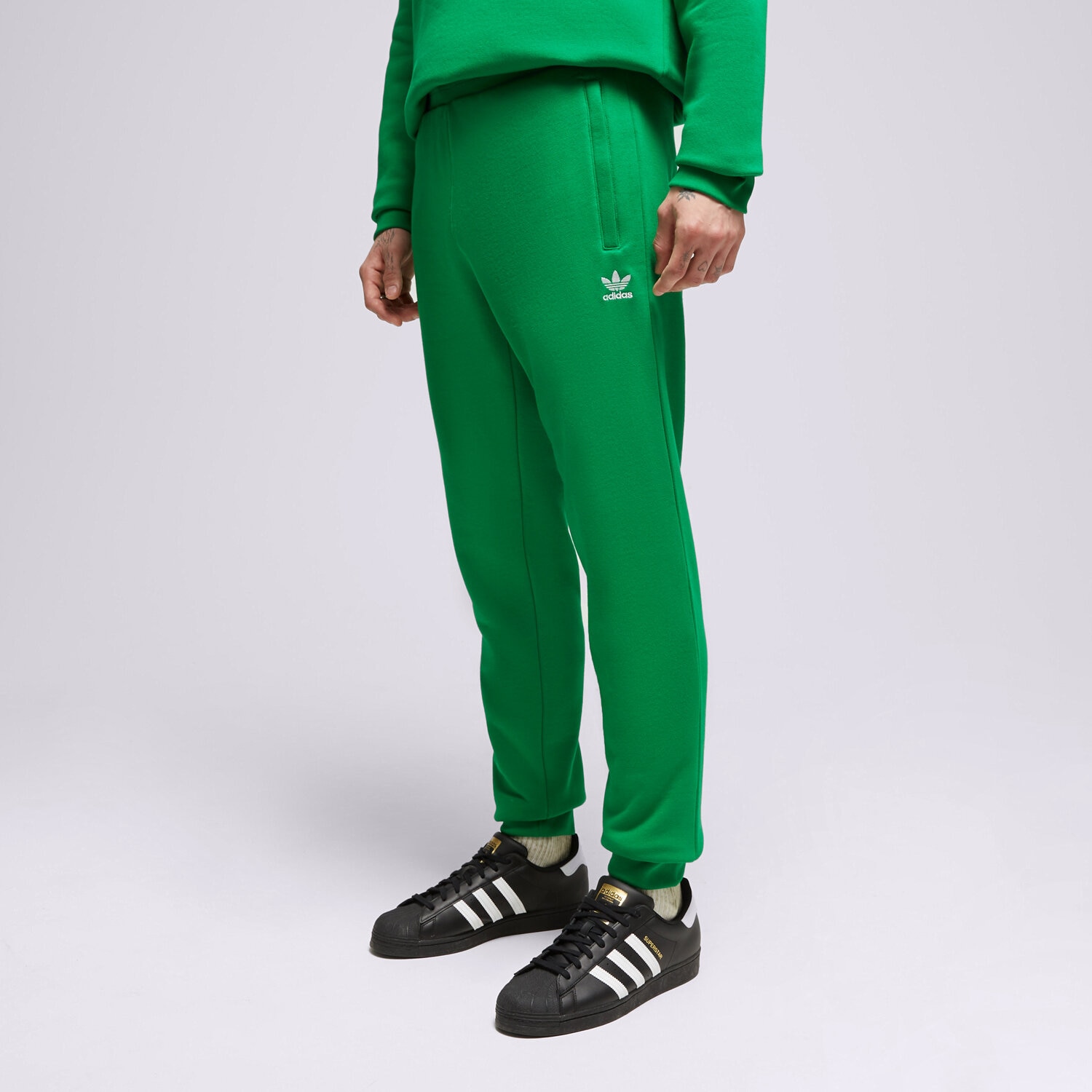 Spodnie sportowe męskie ADIDAS SPODNIE ESSENTIALS PANT IM2102 ZIELONY