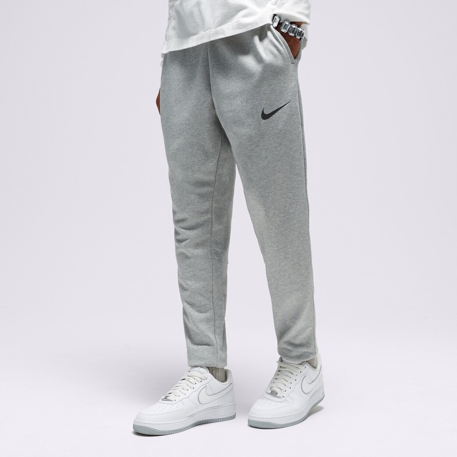 Spodnie sportowe męskie NIKE SPODNIE M NK DF FLC PANT TAPER CZ6379-063 SZARY