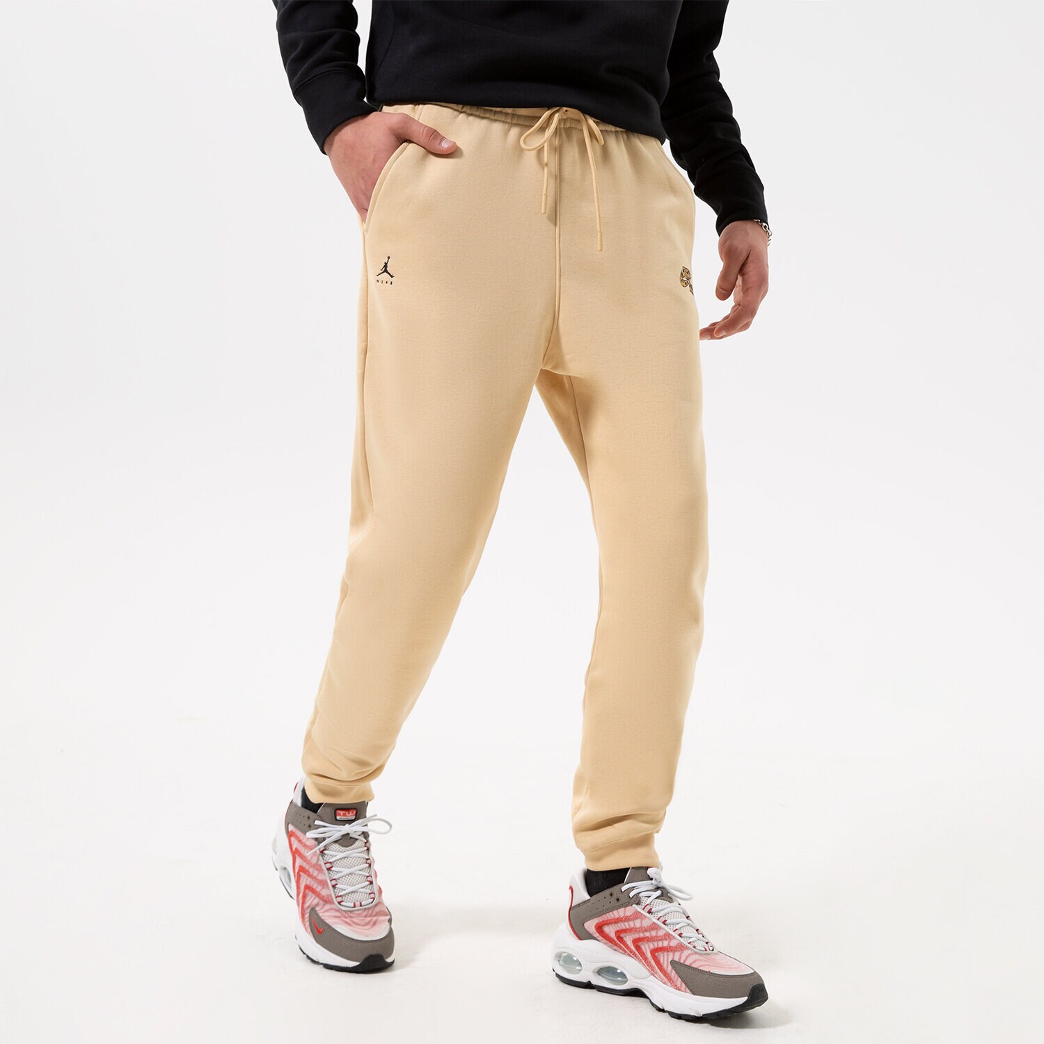 Spodnie sportowe męskie JORDAN SPODNIE M J FLT MVP HBR FLC PANT DQ8100-252 BEŻOWY