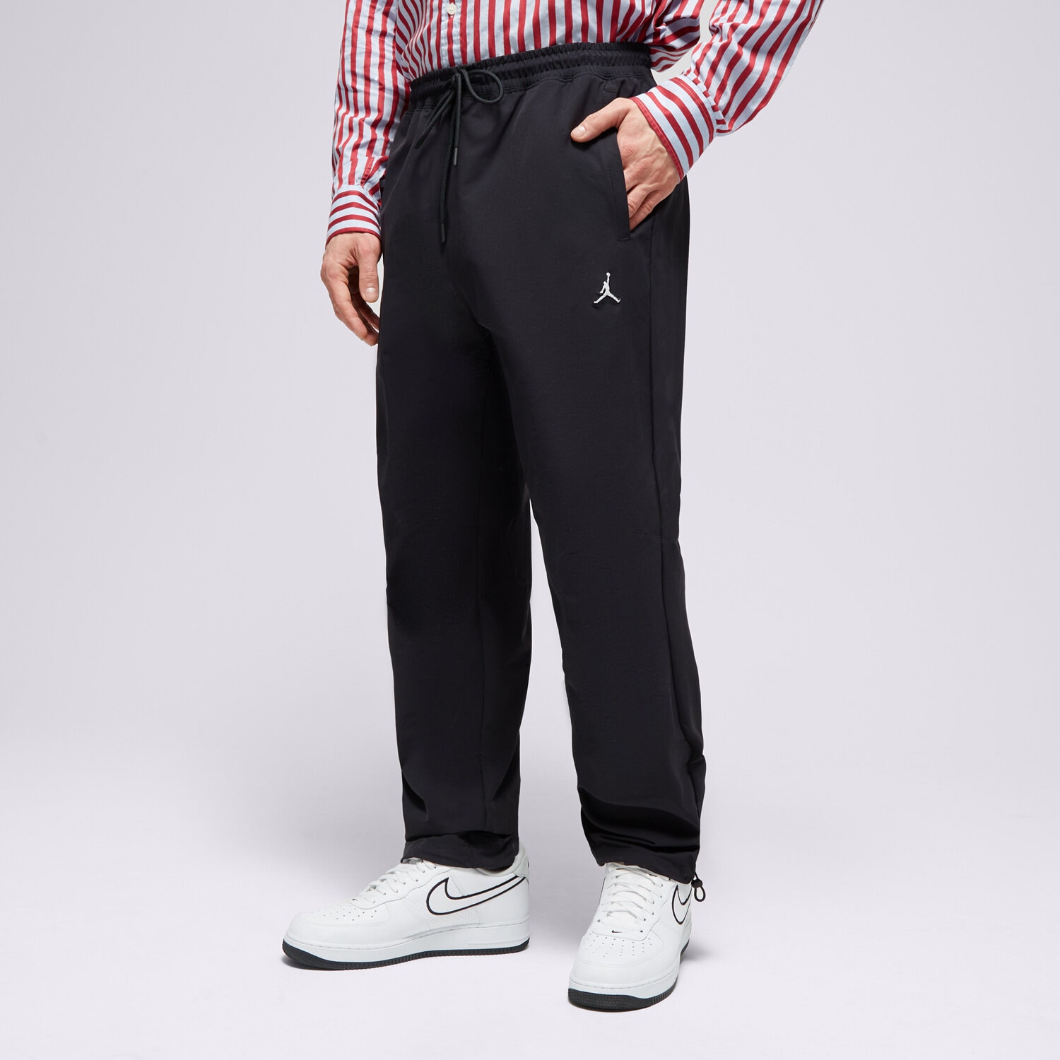 Spodnie sportowe męskie JORDAN SPODNIE M J ESS WOVEN DQ7509-010 CZARNY