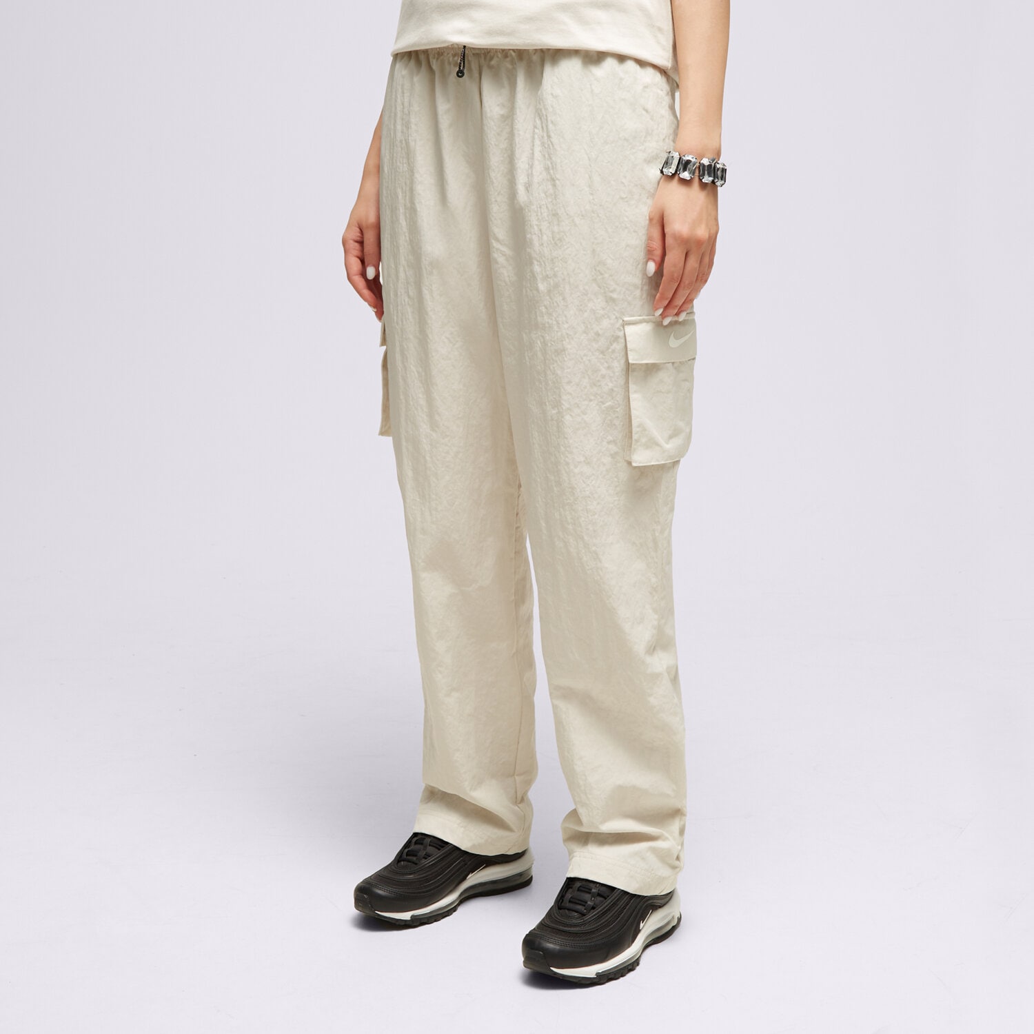 Spodnie sportowe damskie NIKE SPODNIE NIKE SPORTSWEAR ESSENTIAL DO7209-104 BEŻOWY