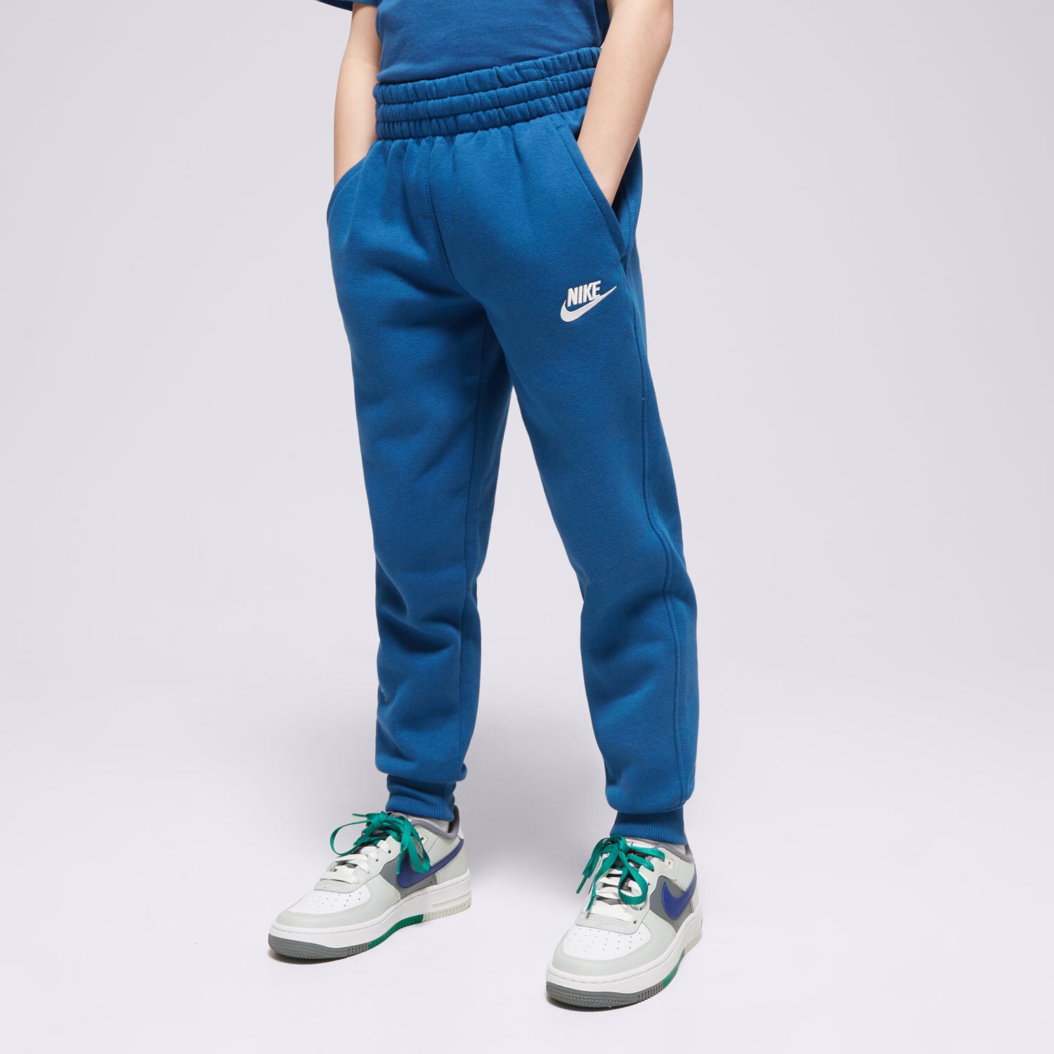 Sportowe spodnie dziecięce NIKE SPODNIE K NSW CLUB FLC JGGR LBR BOY FD3008-476 NIEBIESKI
