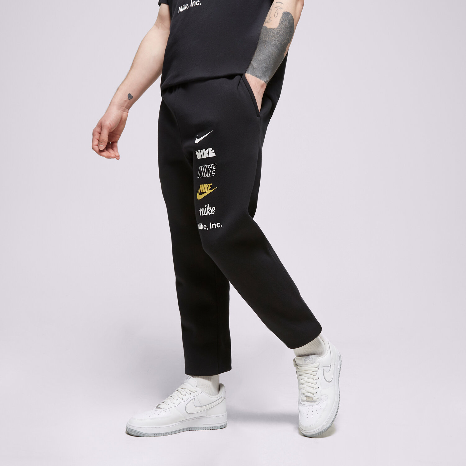 Spodnie sportowe męskie NIKE SPODNIE M NK CLUB+ BB CF PANT MLOGO DX0795-010 CZARNY