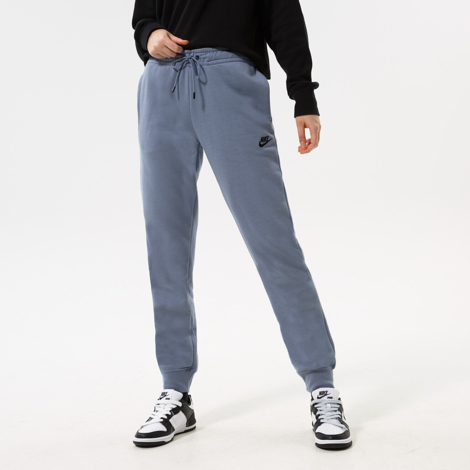 Spodnie sportowe damskie NIKE SPODNIE W NSW ESSNTL REG FLC MR DX2320-493 NIEBIESKI