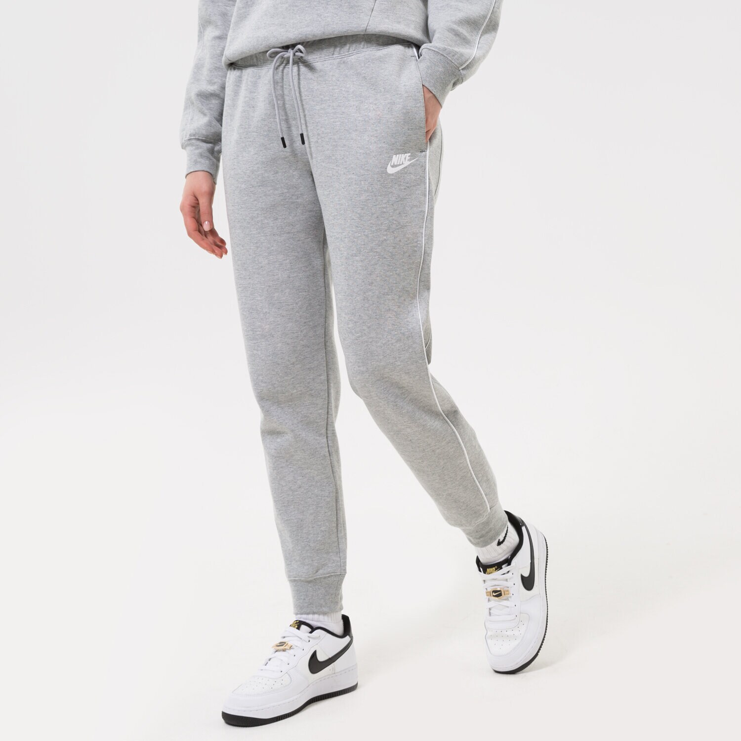 Spodnie sportowe damskie NIKE SPODNIE W NSW MLNM ESSNTL FLC MR CZ8340-063 SZARY