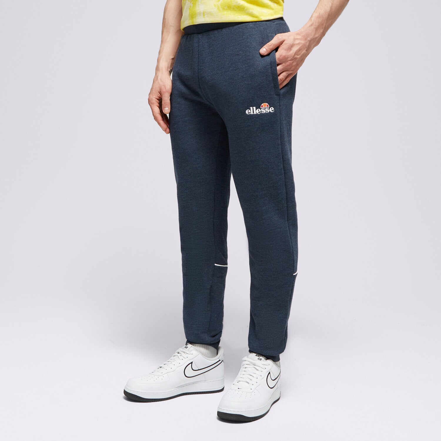 Spodnie sportowe męskie ELLESSE SPODNIE ROACH JOGGER NVY MRL SJD11972430 GRANATOWY