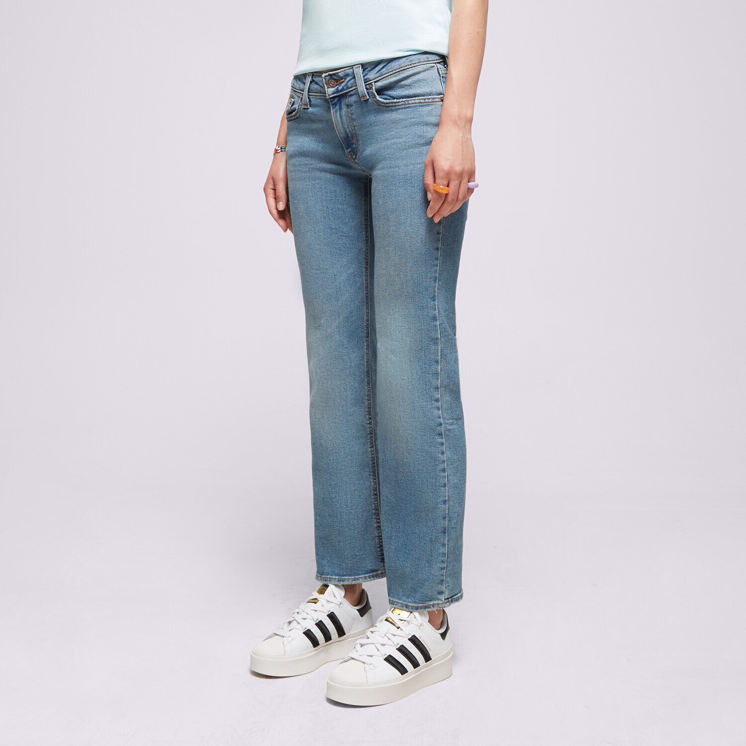 Spodnie sportowe damskie LEVI'S SPODNIE SUPERLOW BOOT MED INDIGO A46790001 NIEBIESKI