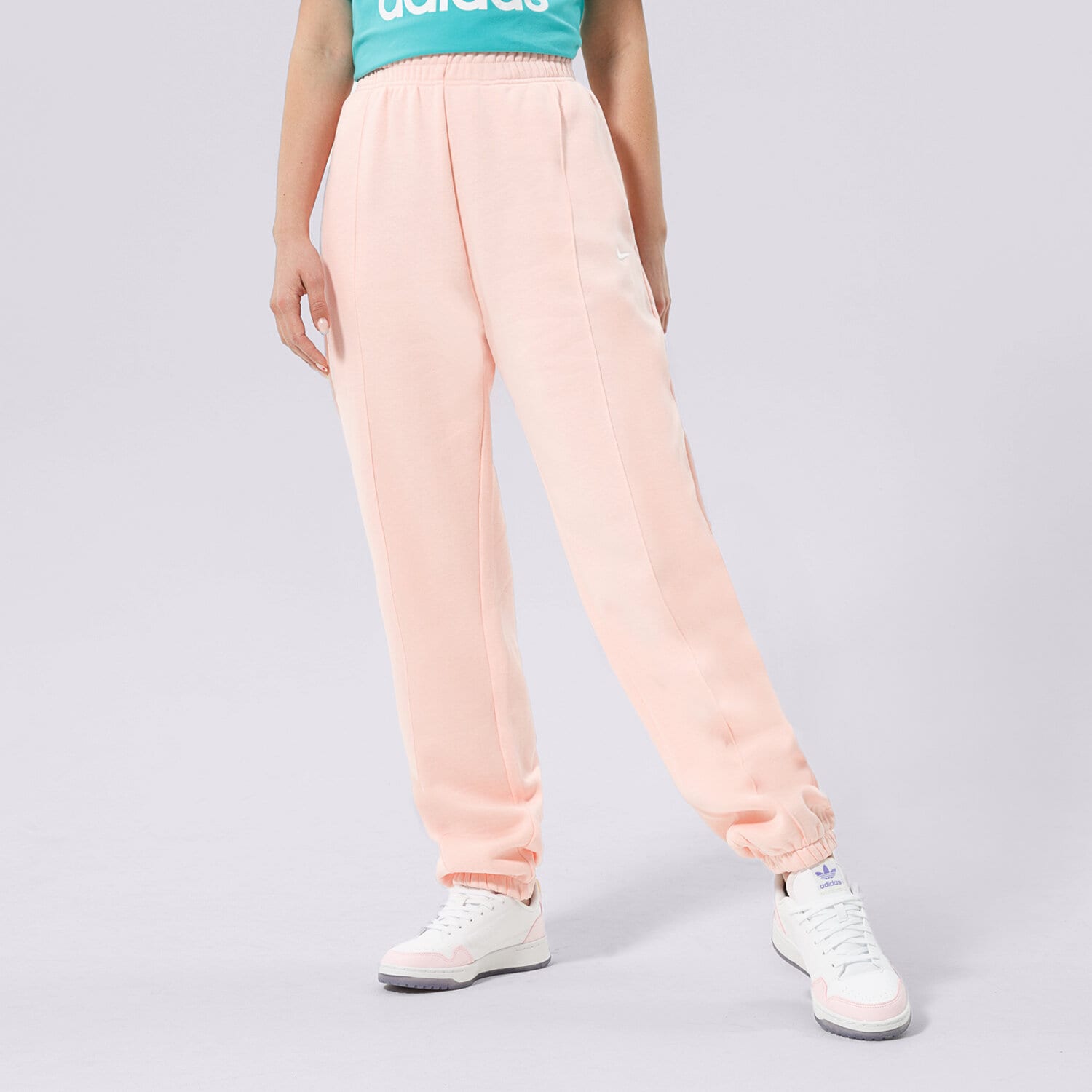 Spodnie sportowe damskie NIKE SPODNIE SPORTSWEAR ESSENTIAL BV4089-610 RÓŻOWY