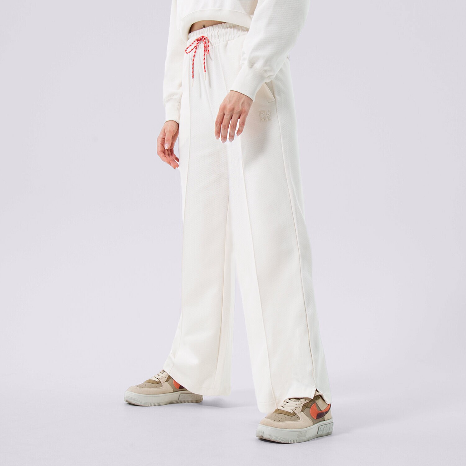 Spodnie sportowe damskie PUMA SPODNIE PUMA INFUSE WIDE LEG PANTS DK 536740-65 BEŻOWY