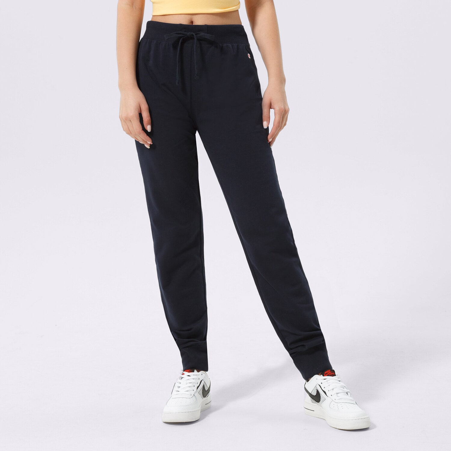 Spodnie sportowe damskie CHAMPION SPODNIE RIB CUFF PANTS 114898BS501 GRANATOWY