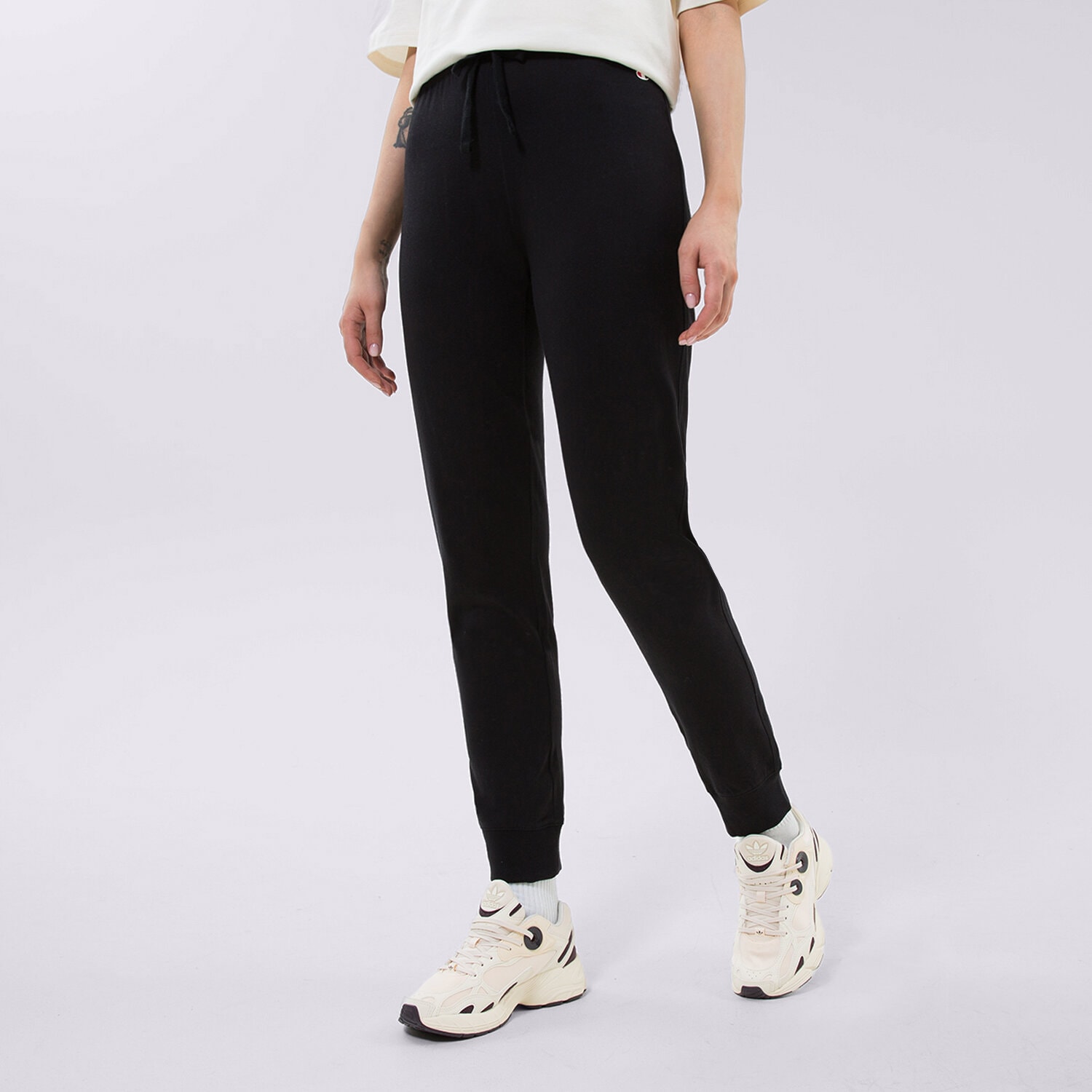 Spodnie sportowe damskie CHAMPION SPODNIE RIB CUFF PANTS 114907KK001 CZARNY