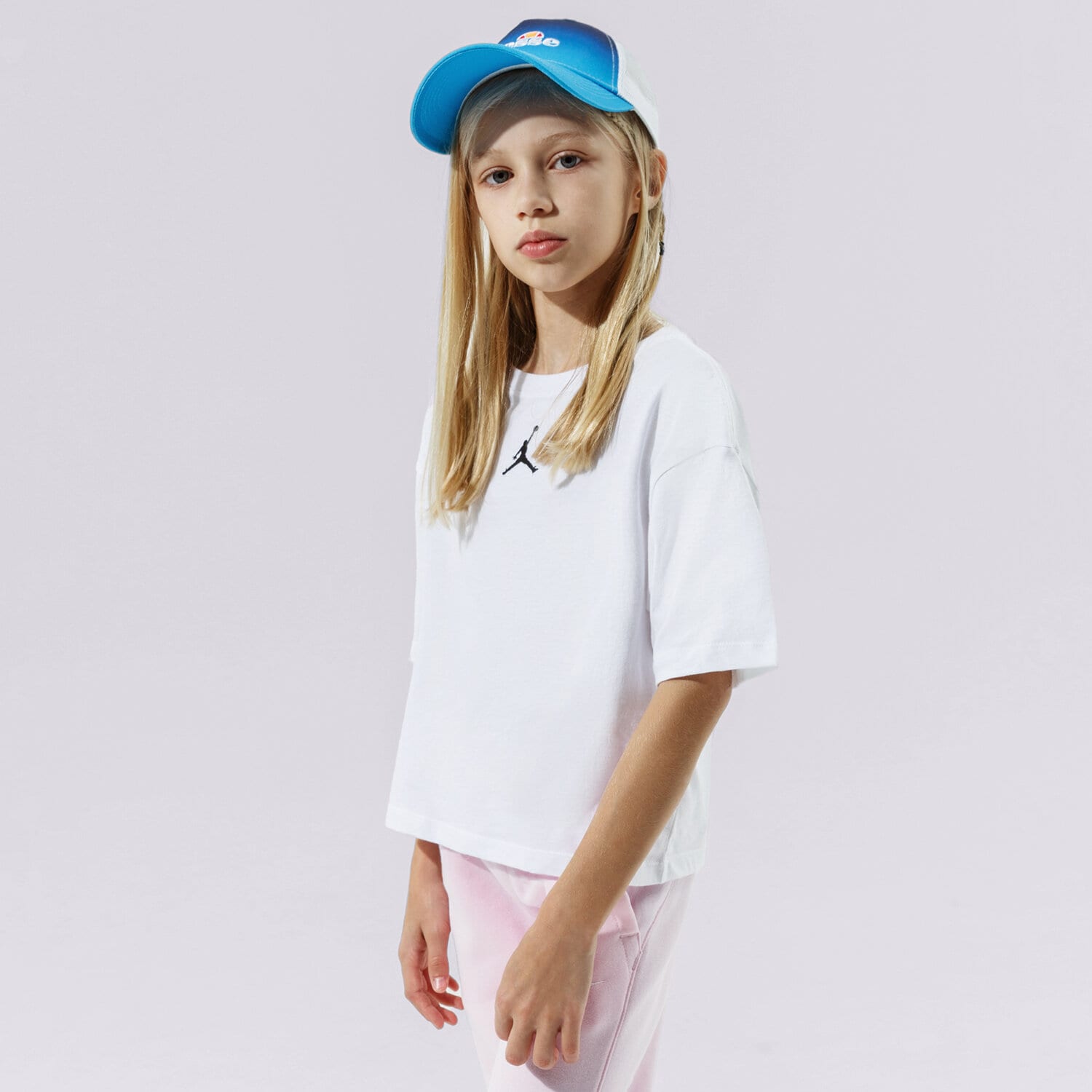 Koszulka, t-shirt dla dzieci JORDAN T-SHIRT JDG ESSENTIALS GIRL 45A770-001 BIAŁY