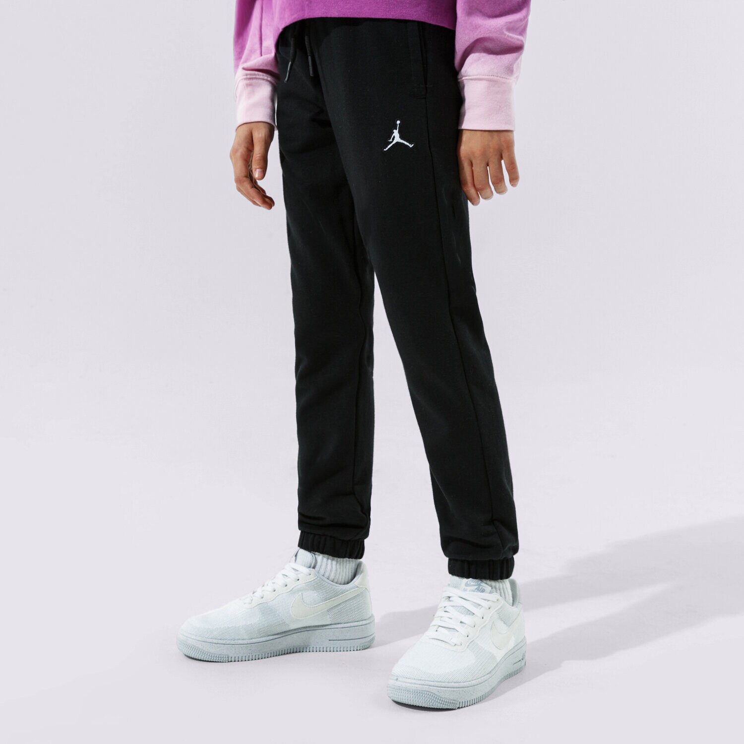 Sportowe spodnie dziecięce JORDAN SPODNIE ESSENTIALS PANT GIRL 45A860-023 CZARNY