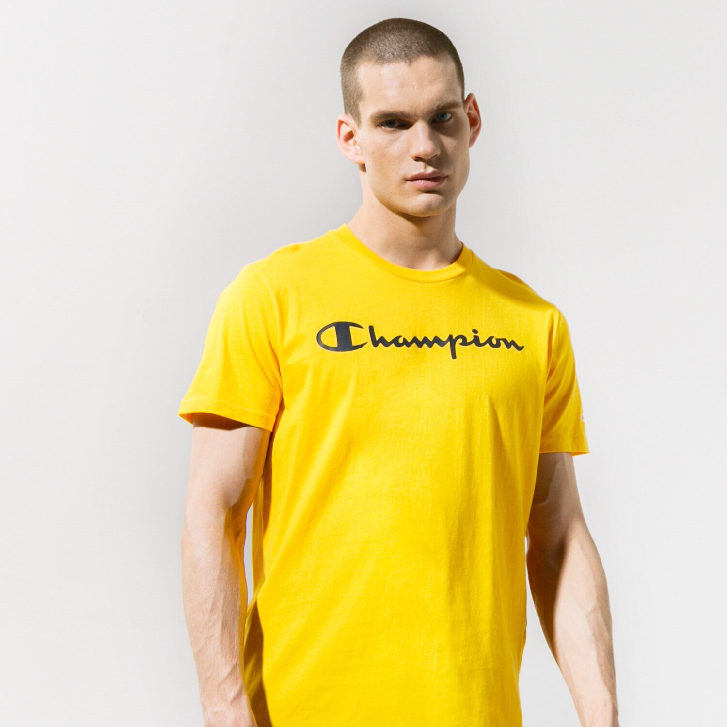 Koszulka, t-shirt sportowy męski CHAMPION T-SHIRT CREWNECK T-SHIRT 216957YS058 ŻÓŁTY