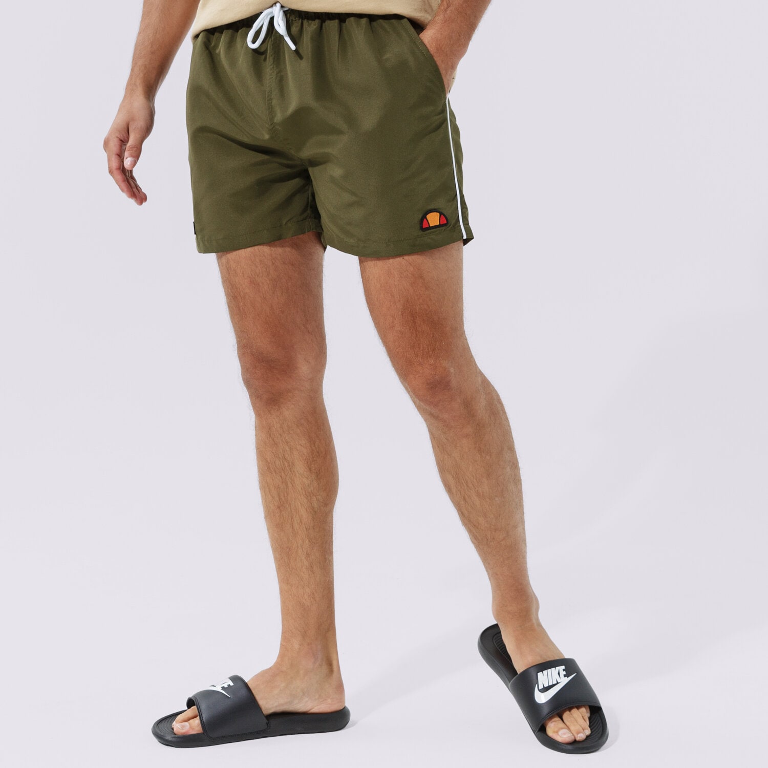 Krótkie spodenki, szorty męskie ELLESSE SZORTY DEM SLACKERS KHA SHS00938506 KHAKI