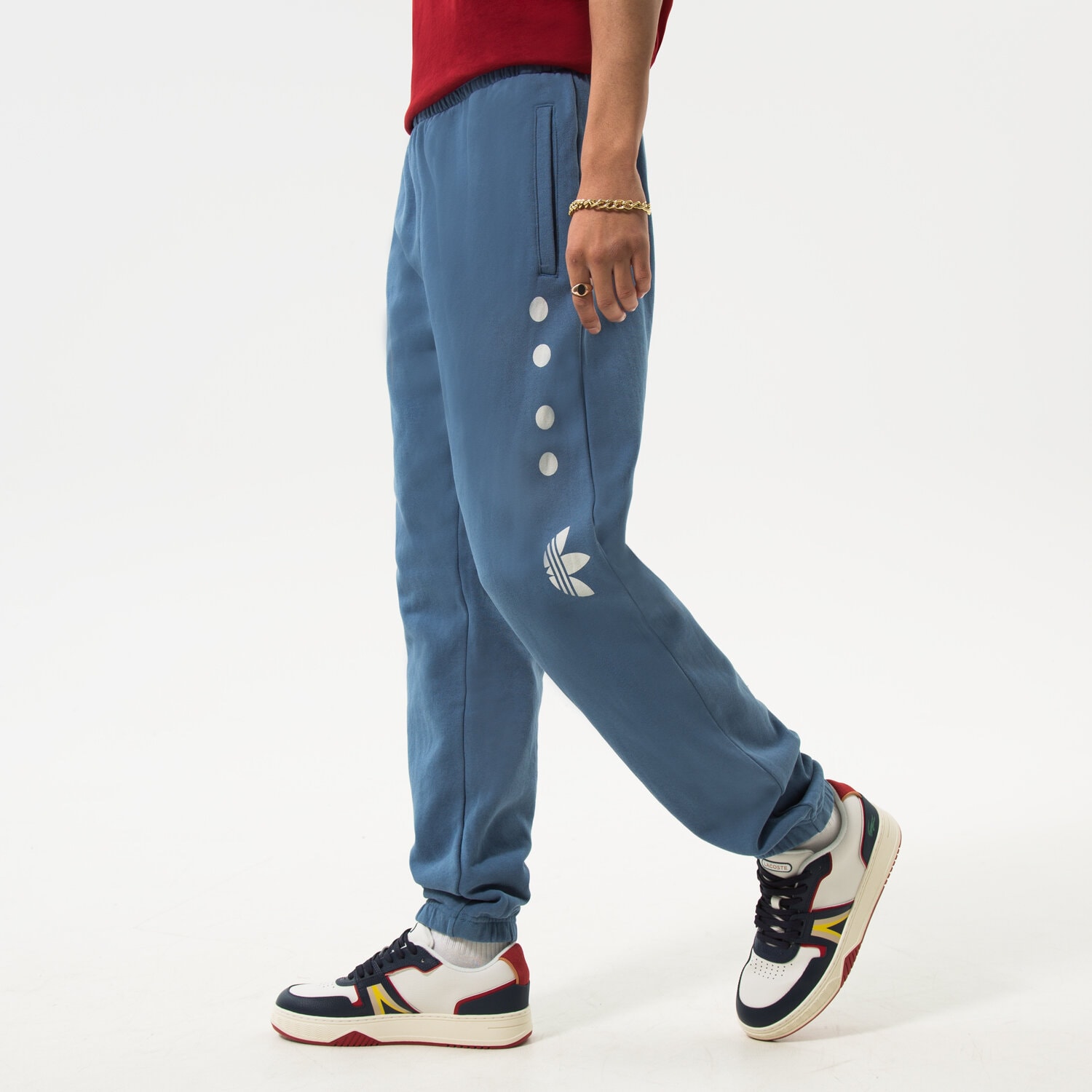 Spodnie sportowe męskie ADIDAS SPODNIE LOGO SWTPNT HM4947 BRĄZOWY