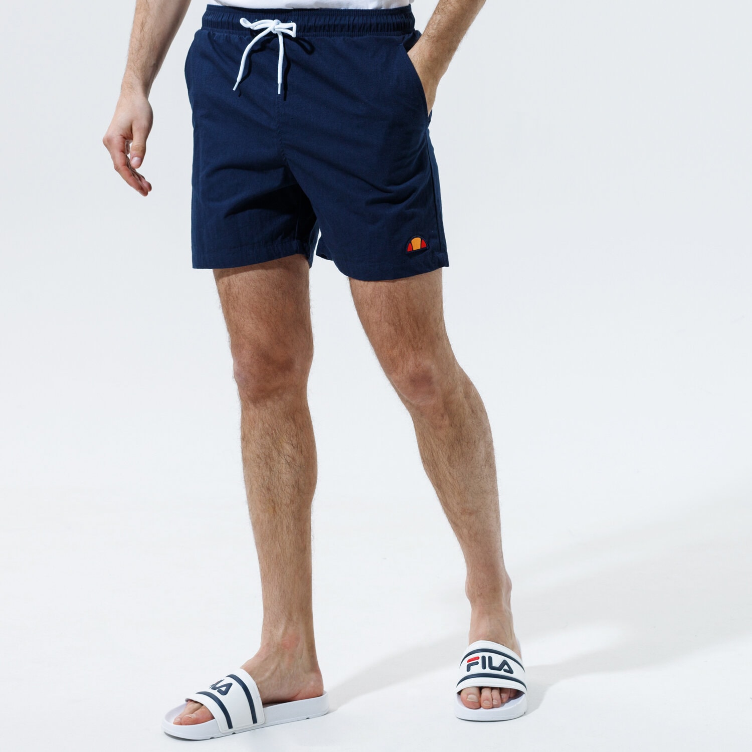 Krótkie spodenki, szorty męskie ELLESSE SZORTY HUGU NAVY SHE09977429 GRANATOWY