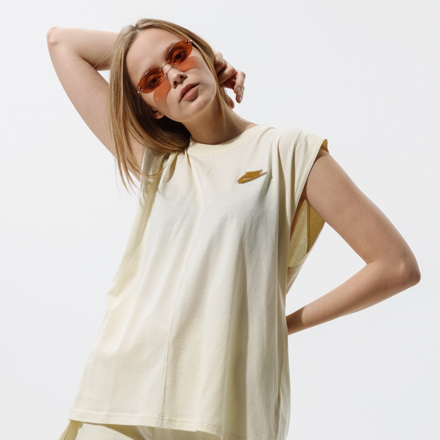 Koszulka, t-shirt damski NIKE T-SHIRT W NSW TANK EARTH DAY CZ9251-113 BEŻOWY