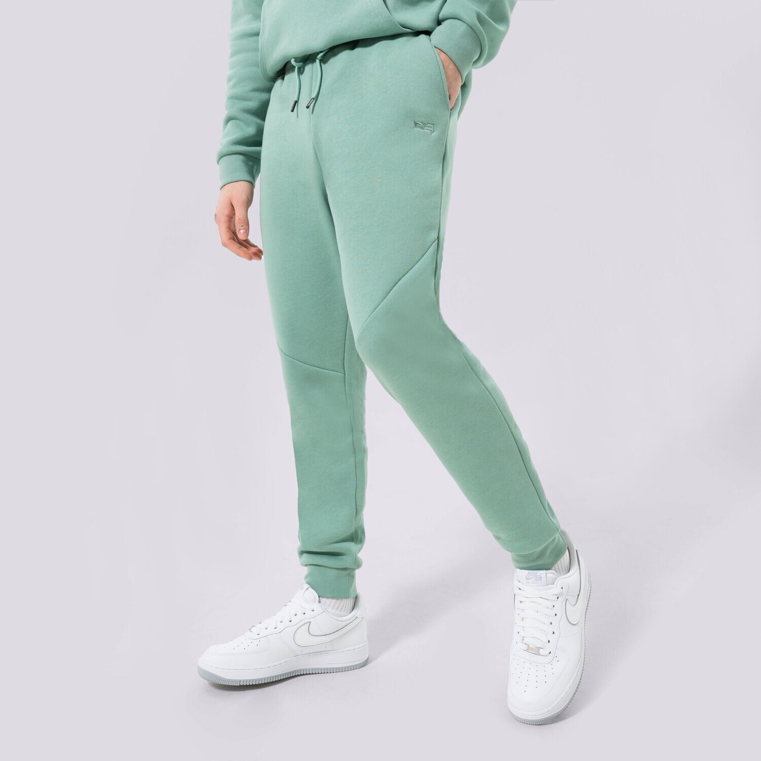Spodnie sportowe męskie CONFRONT SPODNIE ESSENTIAL GREEN CF123SPM90003 ZIELONY