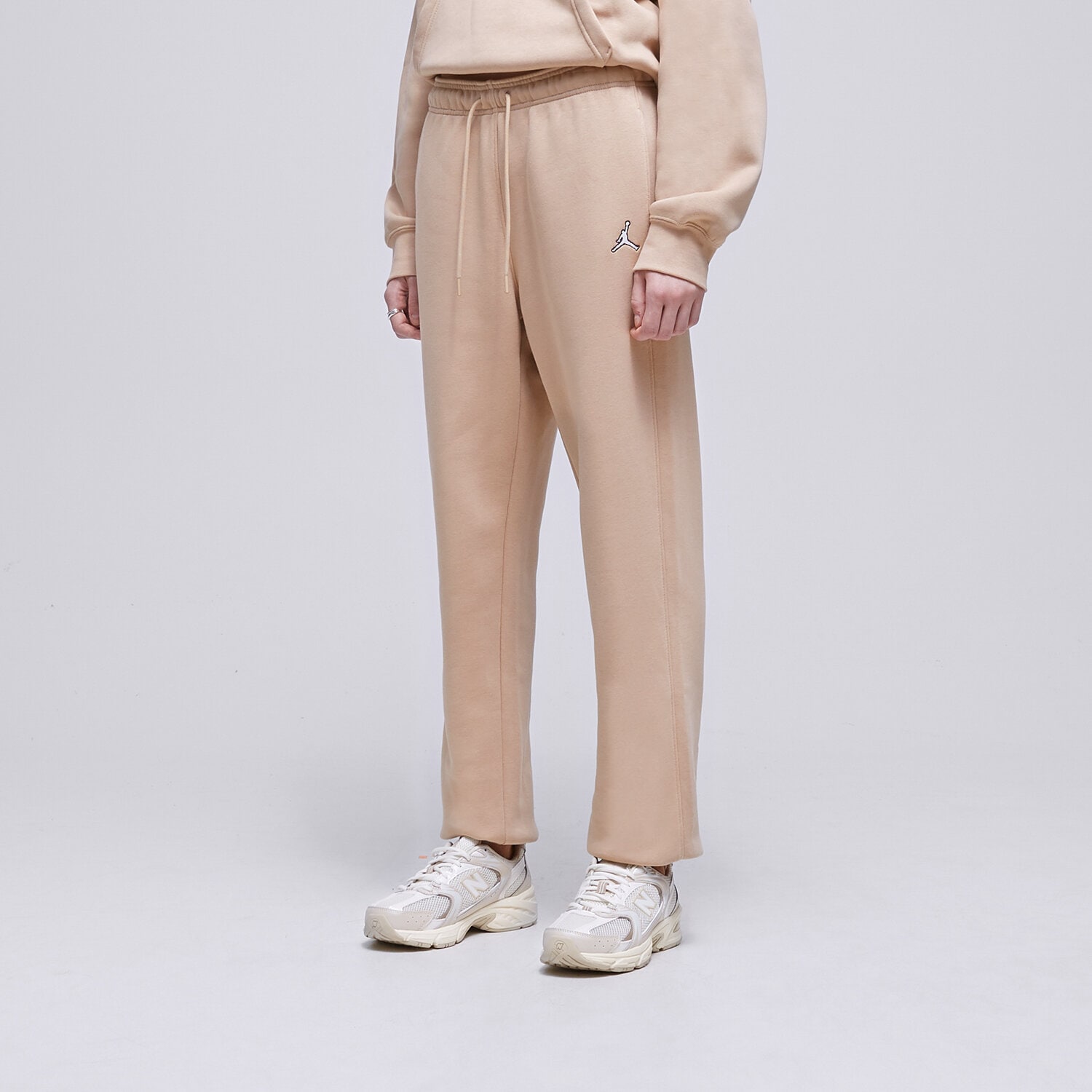 Spodnie sportowe damskie JORDAN SPODNIE W J BRKLN FLC PANT DQ4478277 DQ4478-277 BEŻOWY