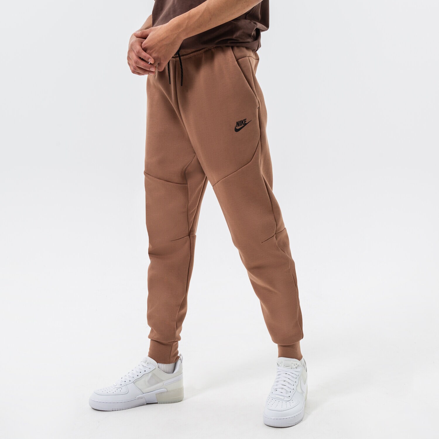 Spodnie sportowe męskie NIKE SPODNIE DV0538 DV0538-256 BRĄZOWY