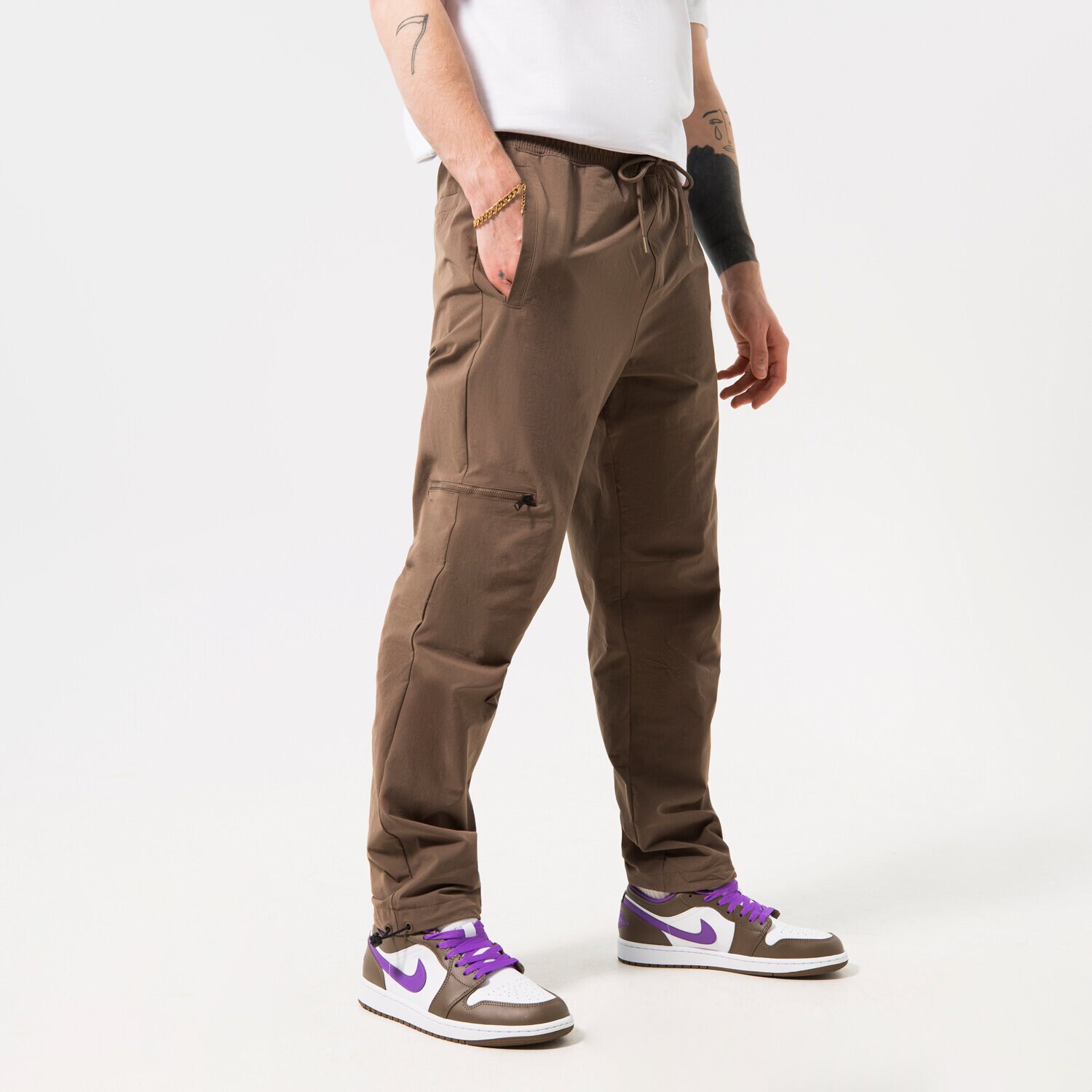 Spodnie sportowe męskie JORDAN SPODNIE M J ESS WOVEN PANT DQ7509-274 SZARY