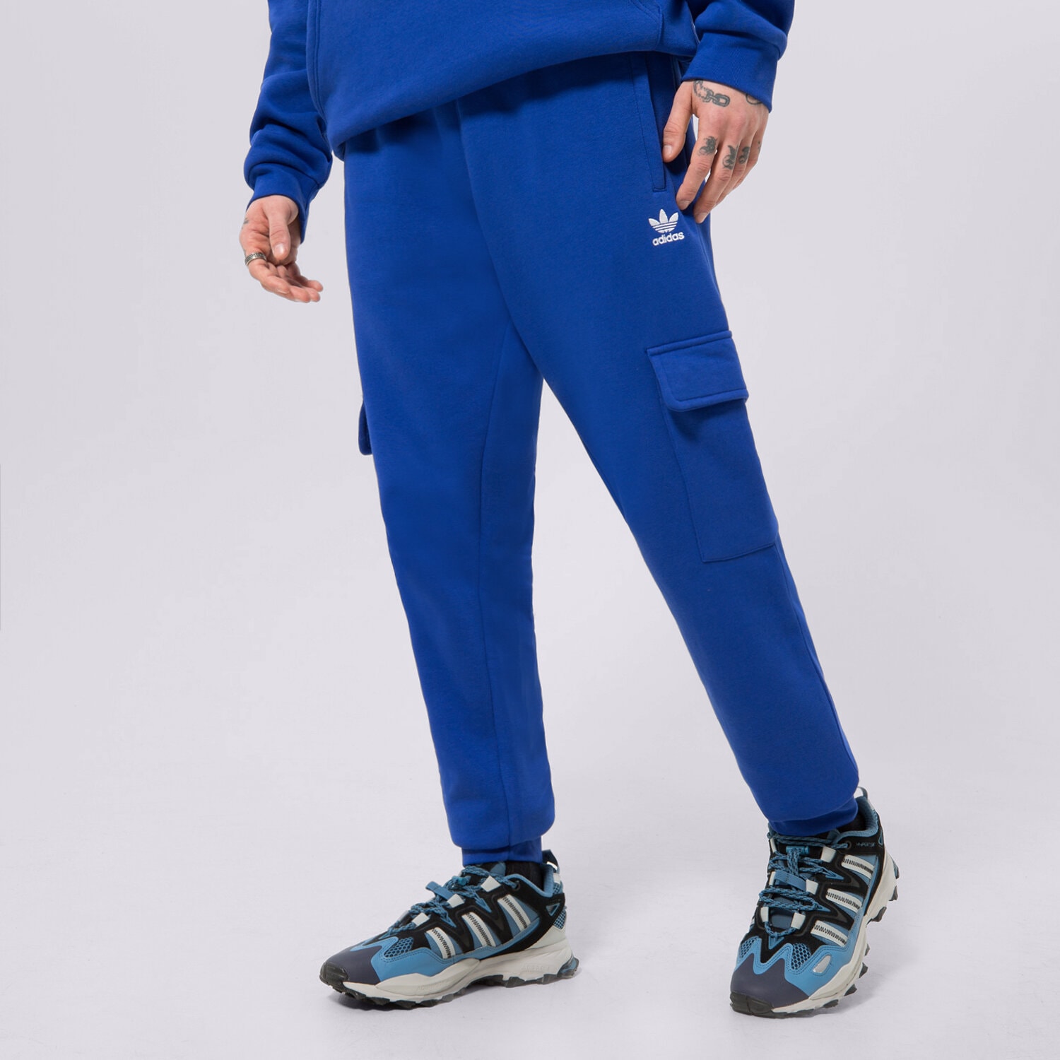 Spodnie sportowe męskie ADIDAS SPODNIE ESSENTIALS C P IA4781 NIEBIESKI