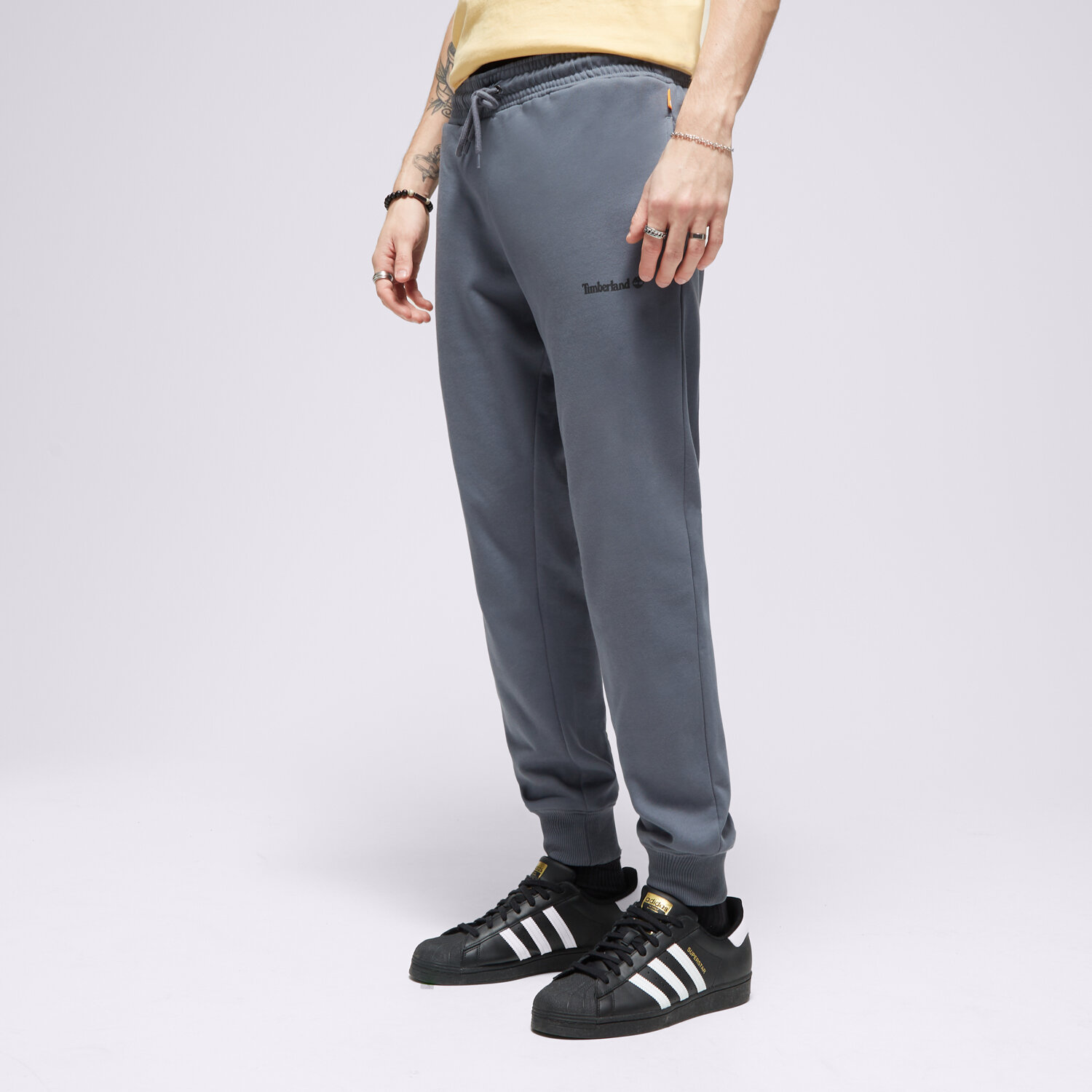 Spodnie sportowe męskie TIMBERLAND SPODNIE SMALL LOGO PRINT TB0A5PF4DH31 GRANATOWY