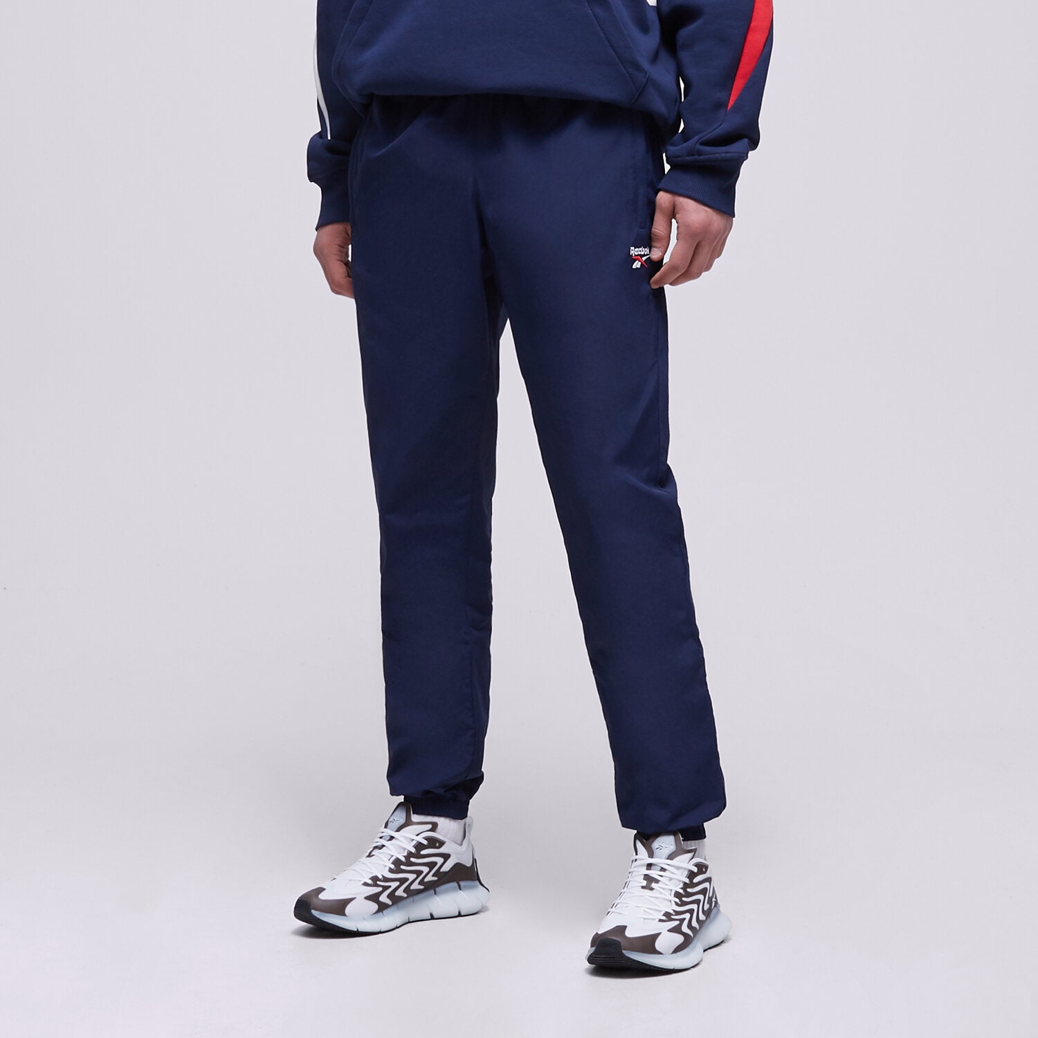 Spodnie sportowe męskie REEBOK SPODNIE CL F FR TRACKPANT H54439 GRANATOWY