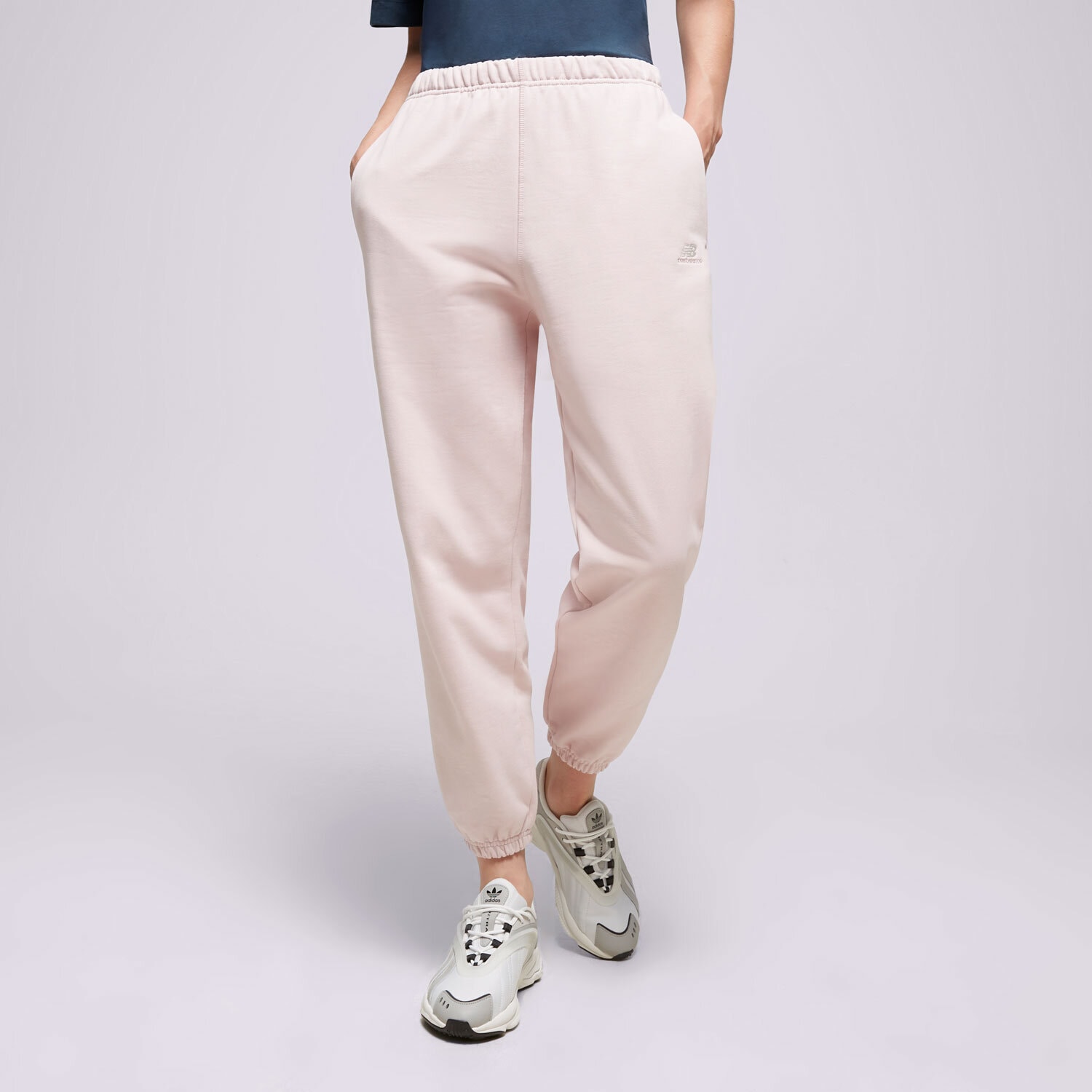 Spodnie sportowe damskie NEW BALANCE SPODNIE ATHLETICS REMASTERED FRENCH WP31503SOI RÓŻOWY