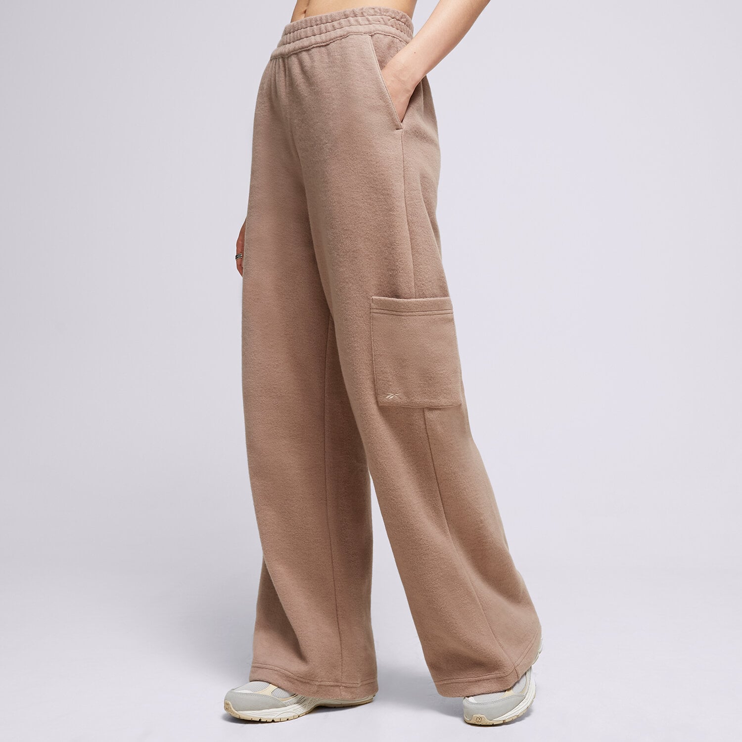 Spodnie sportowe damskie REEBOK SPODNIE CL WDE FL WIDE LEG PANT HS0384 FIOLETOWY